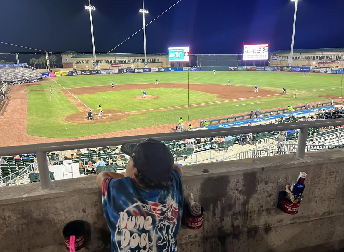 Photo of Whitehorn boy watching a minor league baseball game at Roger Dean Stadium in Jupiter FL.