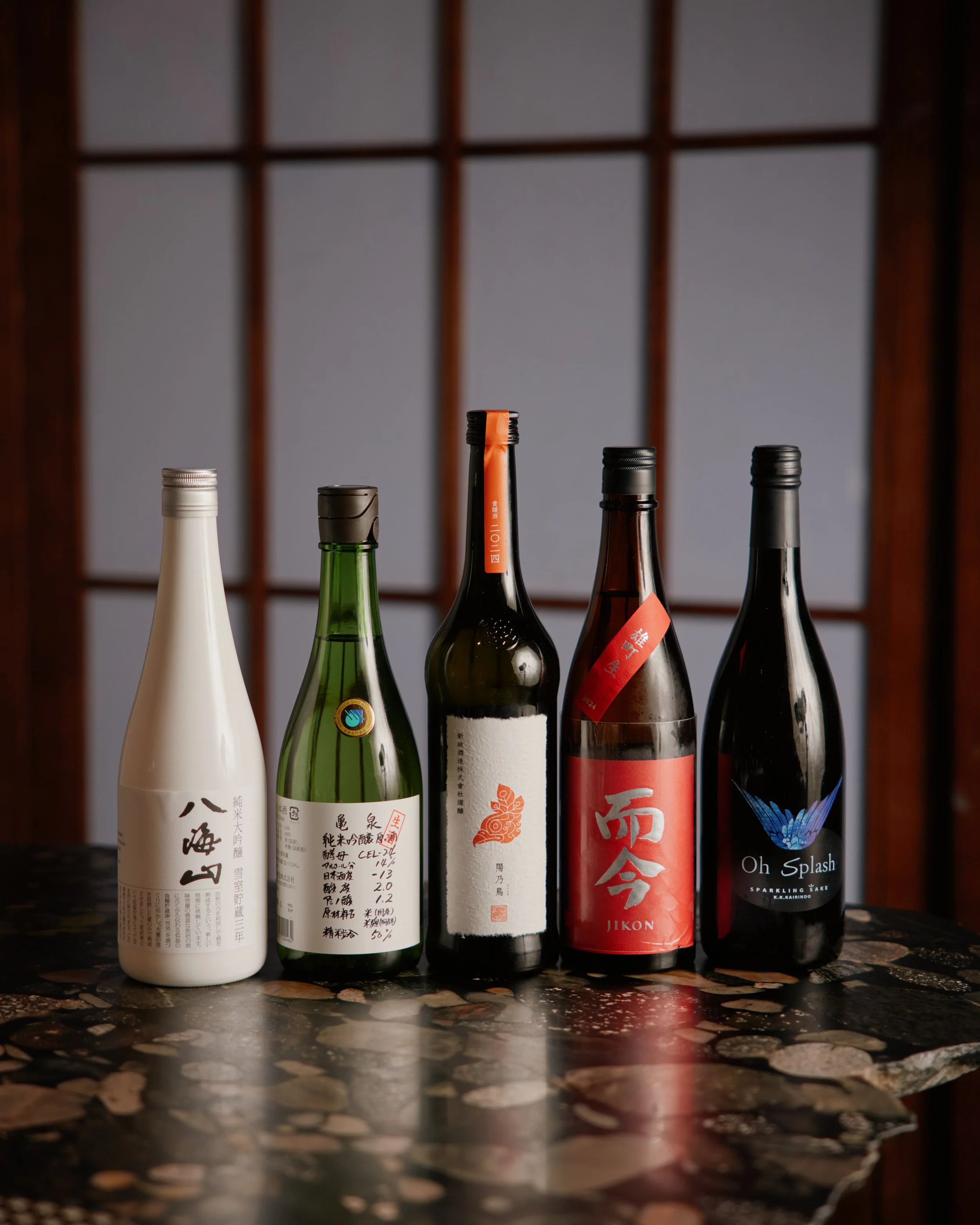 Curated sake collection including Jikon and Oh Splash at a Melbourne CBD sake bar