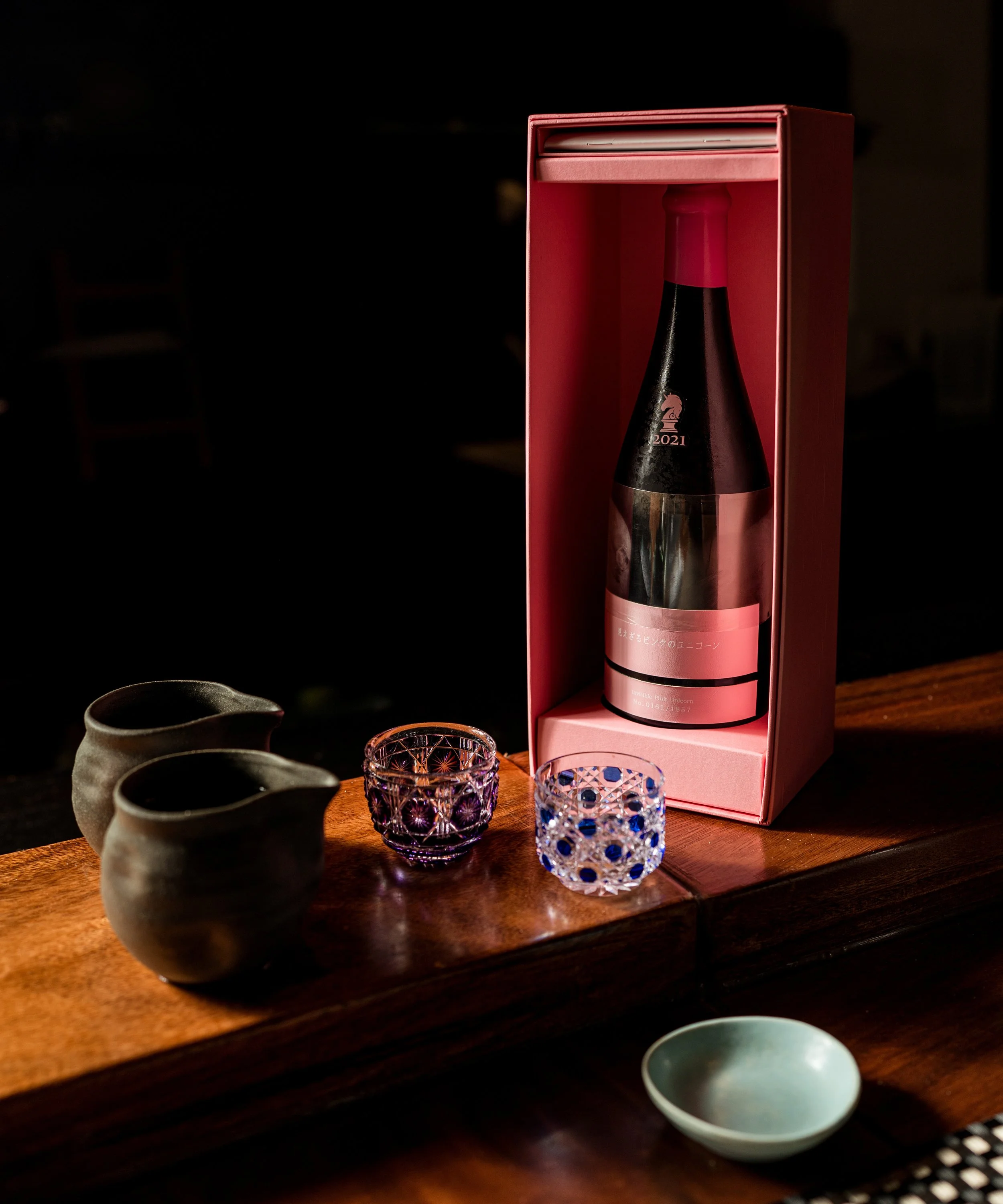 Luxury Japanese sake bottle with traditional ochoko cups at a Melbourne CBD sake bar