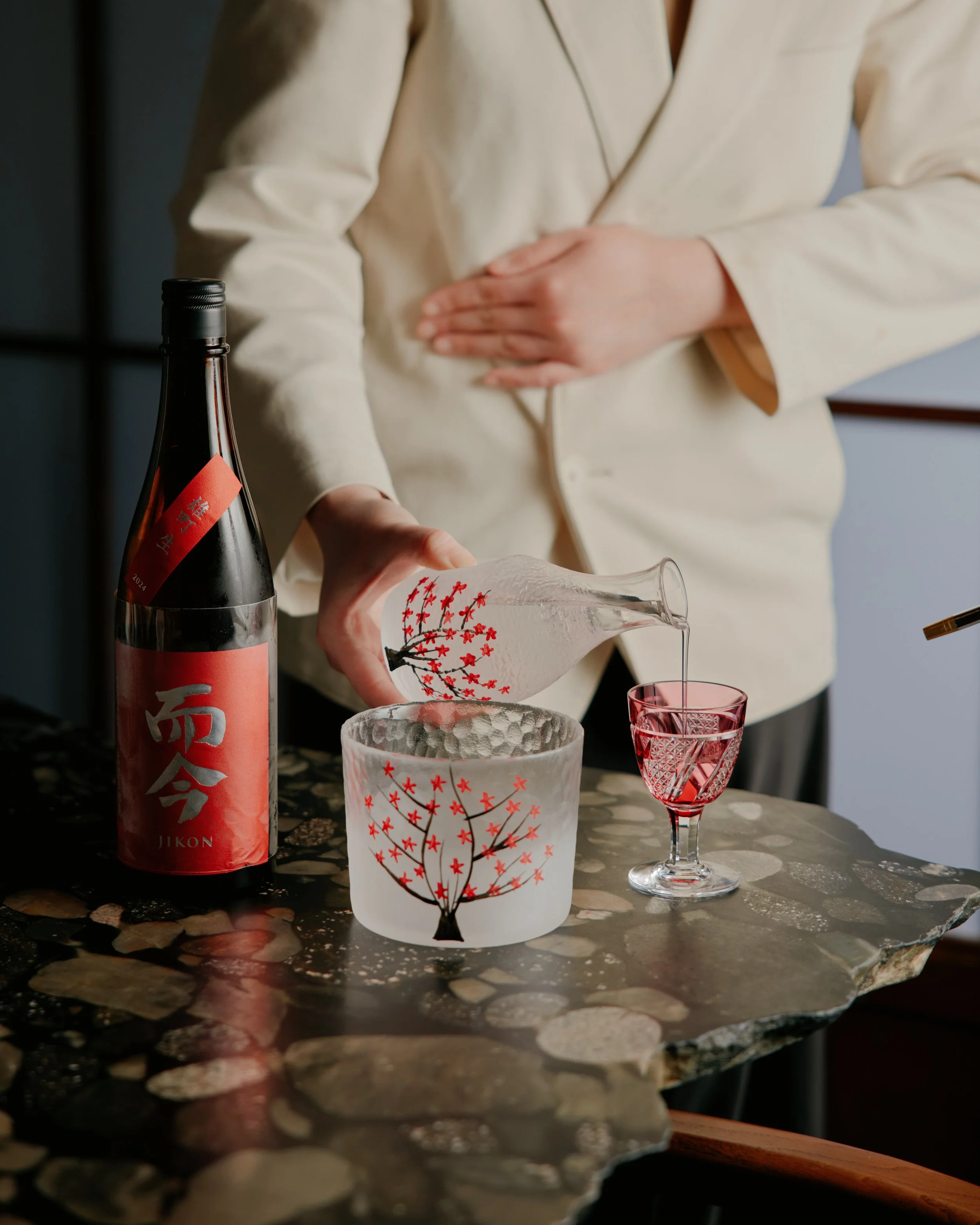 Traditional Japanese sake pour at Melbourne CBD izakaya
