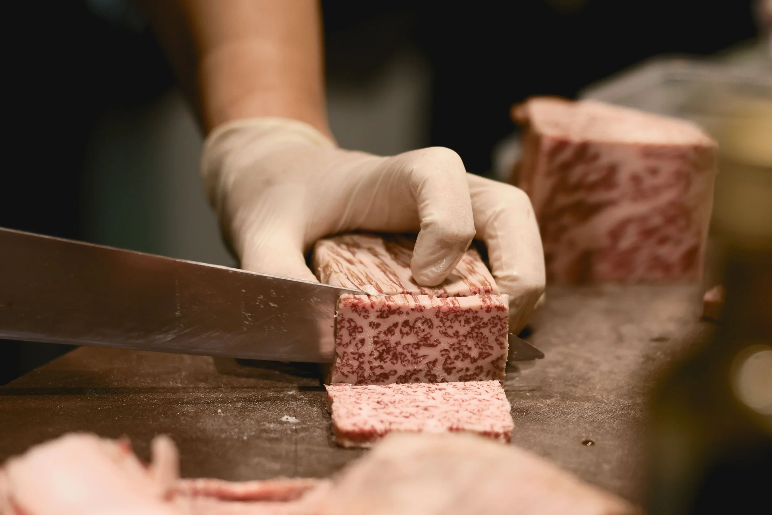 Chef preparing A5 Miyazaki wagyu at Melbourne CBD Japanese restaurant