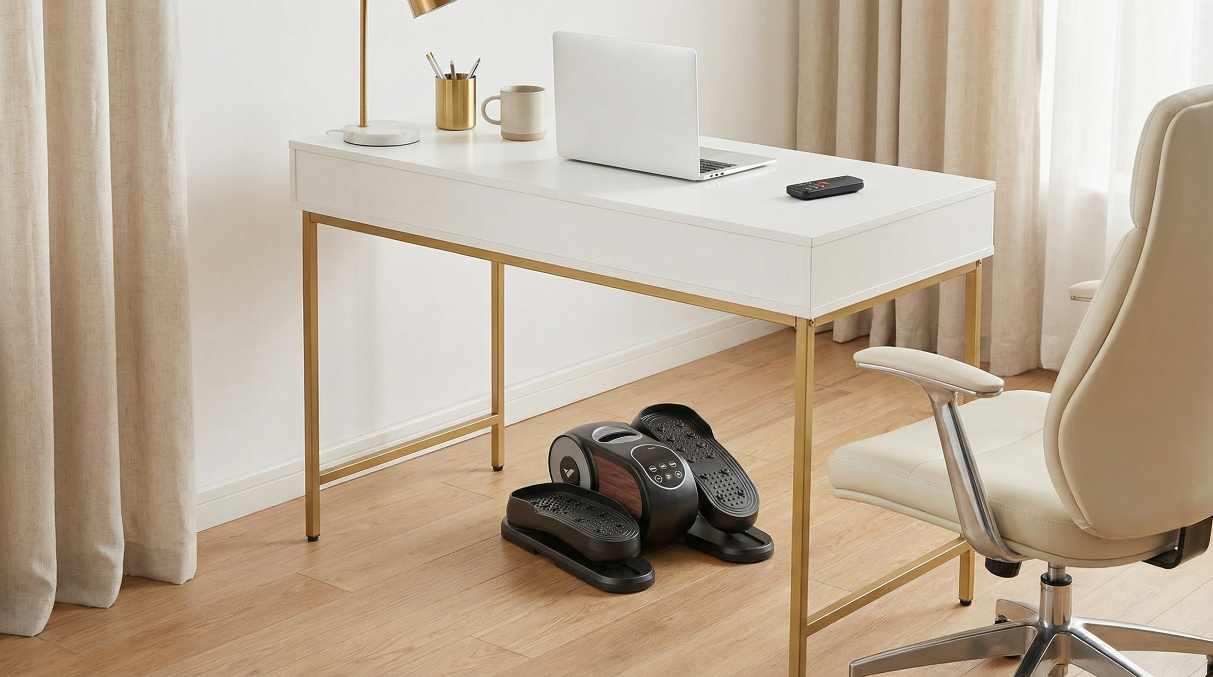 Compact under-desk stepper partially visible beneath a clean desk, allowing discreet movement during meetings and focused work.
