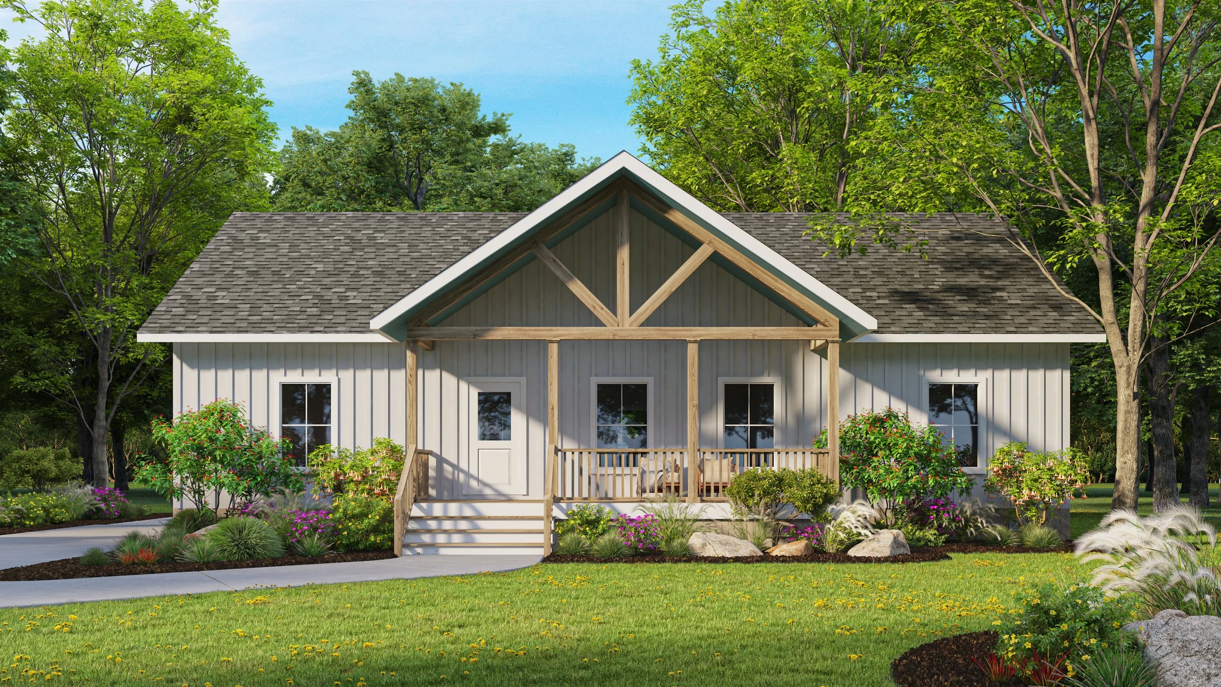 A house with white vertical siding, a gabled roof, and a front porch with wooden columns, surrounded by a lush green lawn, bushes, flowers, and trees.