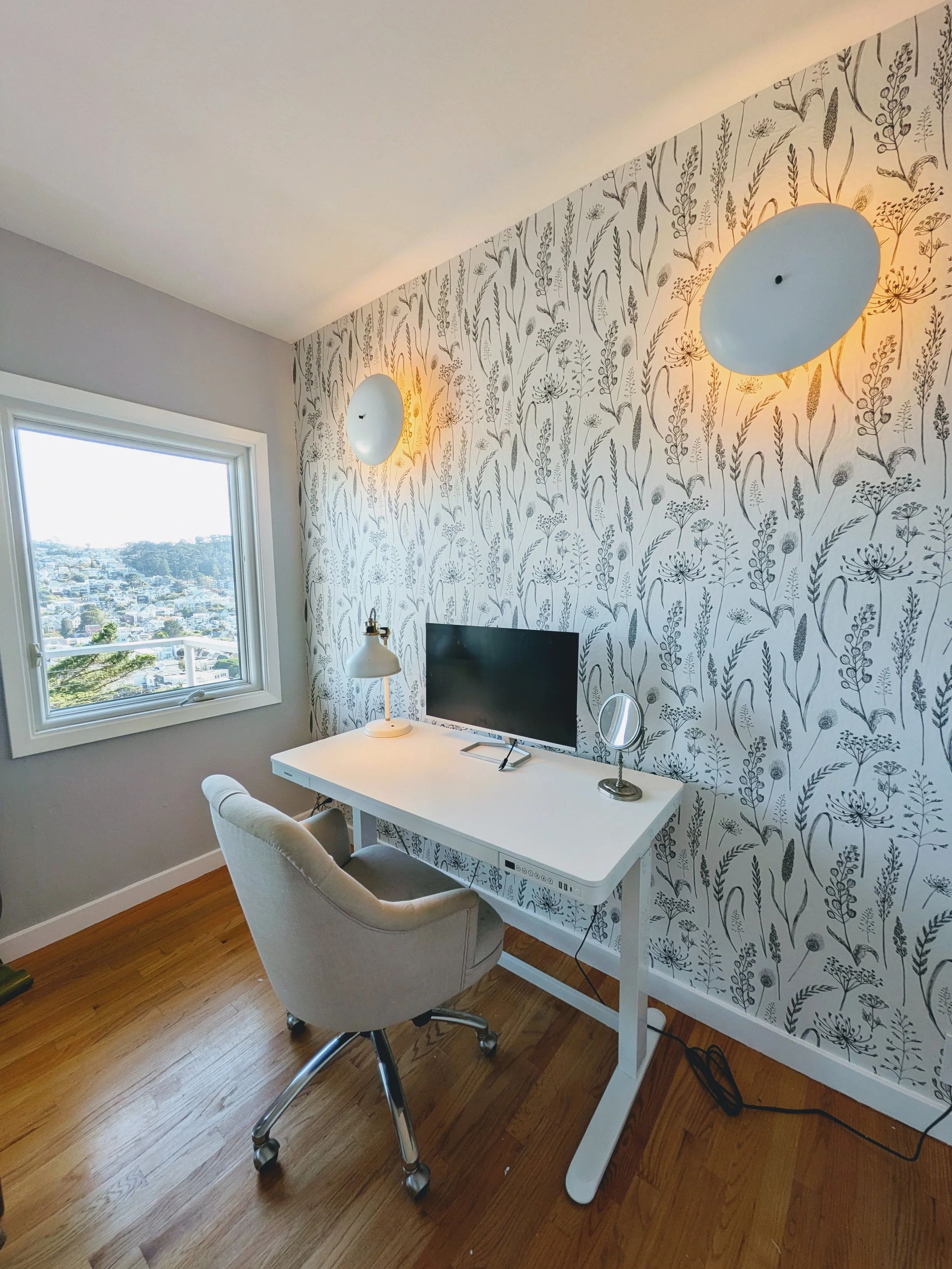Home office with electric standing desk