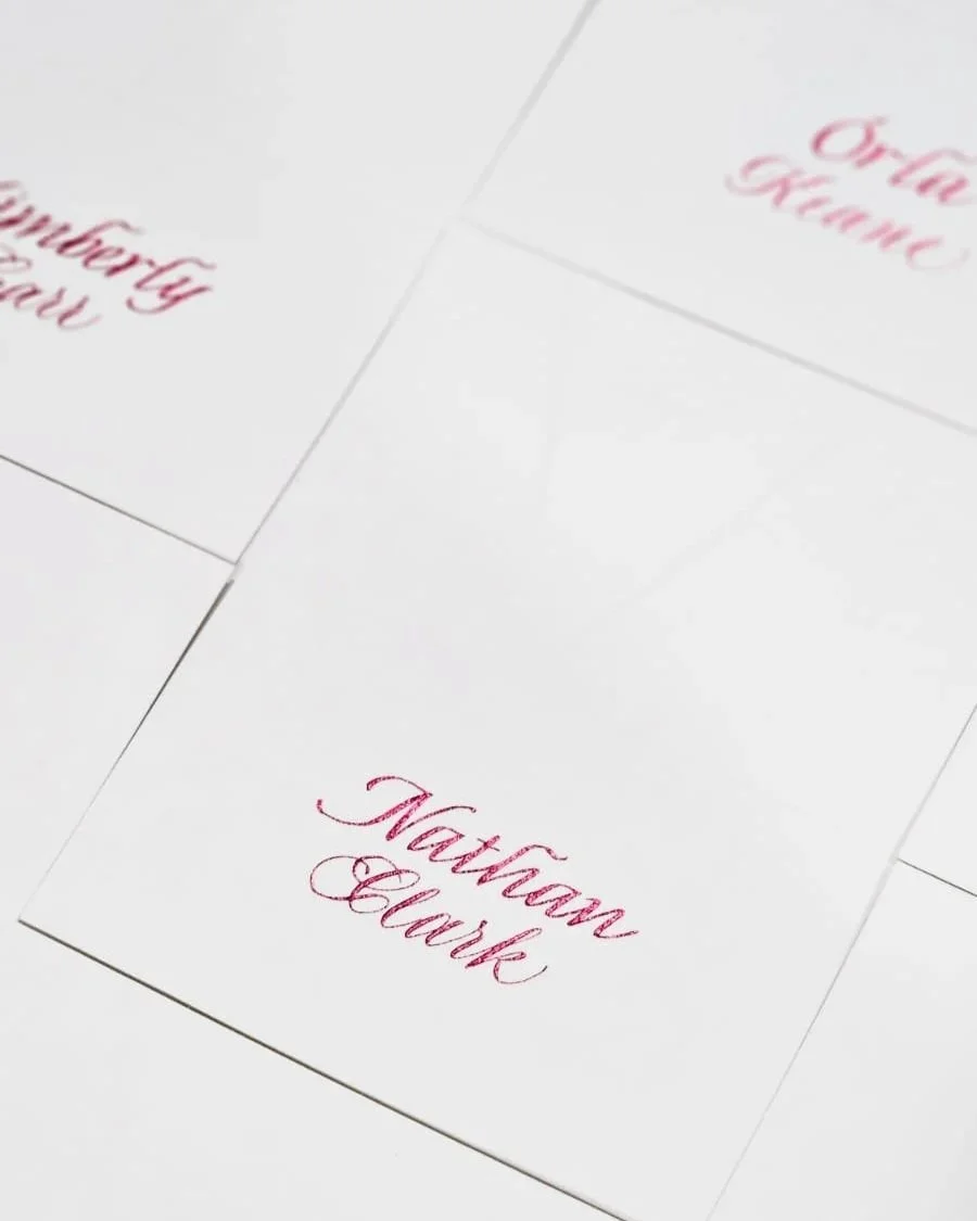 Bespoke calligraphy placecards for Adobe, in our signature combination scripts of Copperplate and Italic