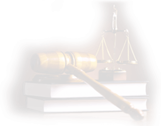 Gavel resting on top of stacked books with a scales of justice in the background.