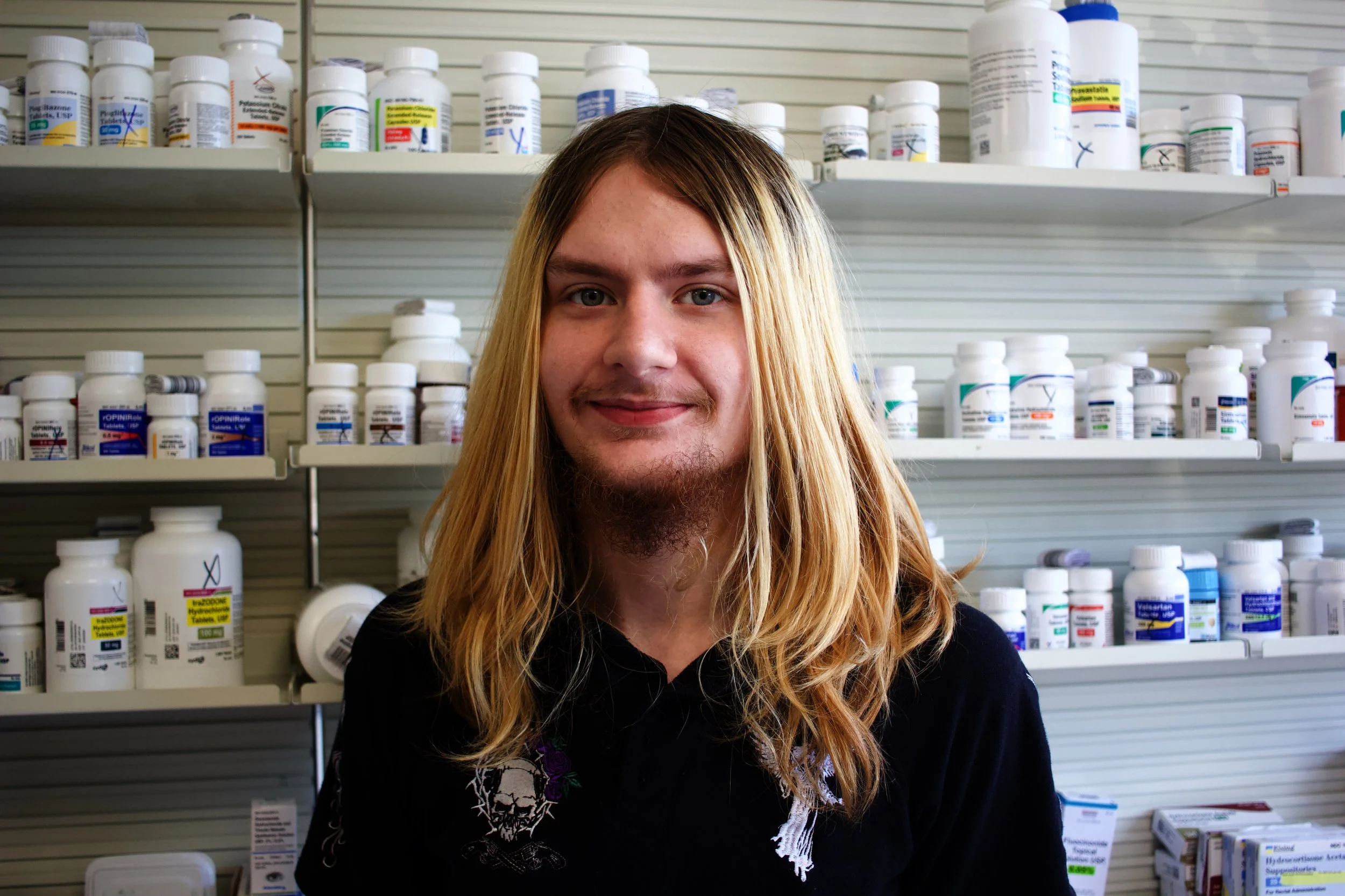 Black and white logo of Nike featuring a swoosh symbol.