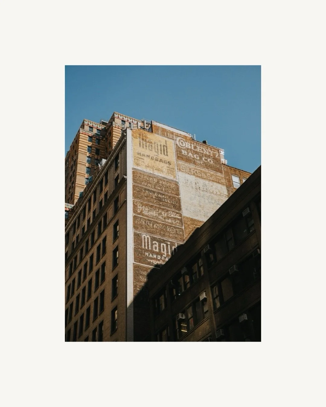Something I came across in New York was ghost signs. They&rsquo;re the old hand-painted adverts you still spot on the sides of buildings, faded by decades of sun and rain.

This one is in Manhattan, and what I love most is the layers. There are sever