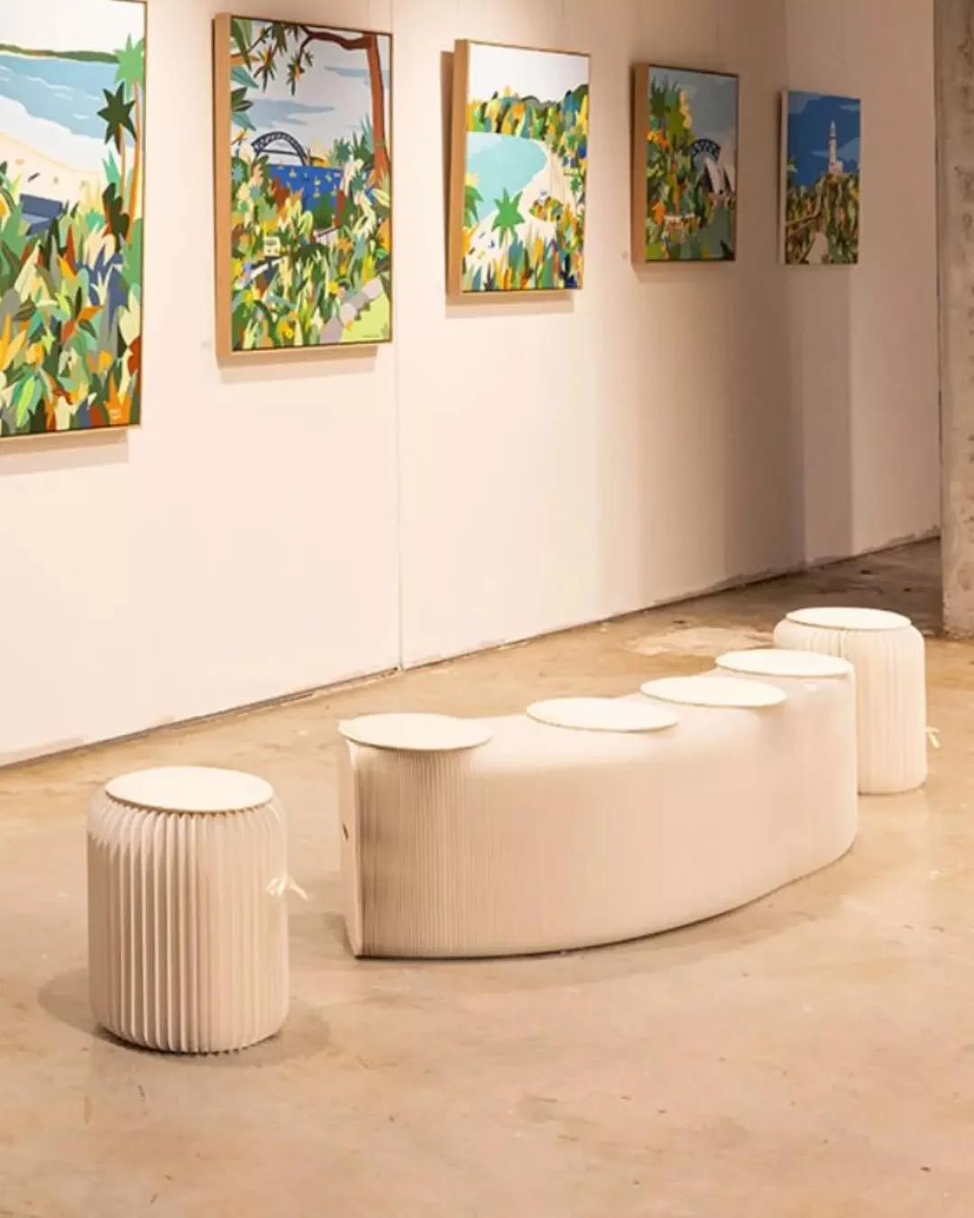 A clean, gallery-inspired and cost effective fit out, quality hanging systems and furniture complete the space ready for an active community art program.

Can you believe these seats and tables are actually cardboard?!

Vacancy no longer... activated