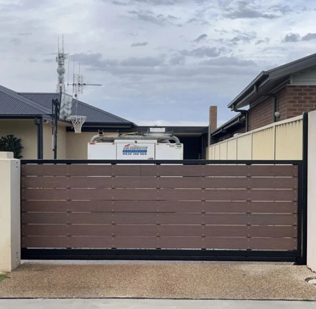 A customer designed cantilever gate manufactured and installed by Nuggets