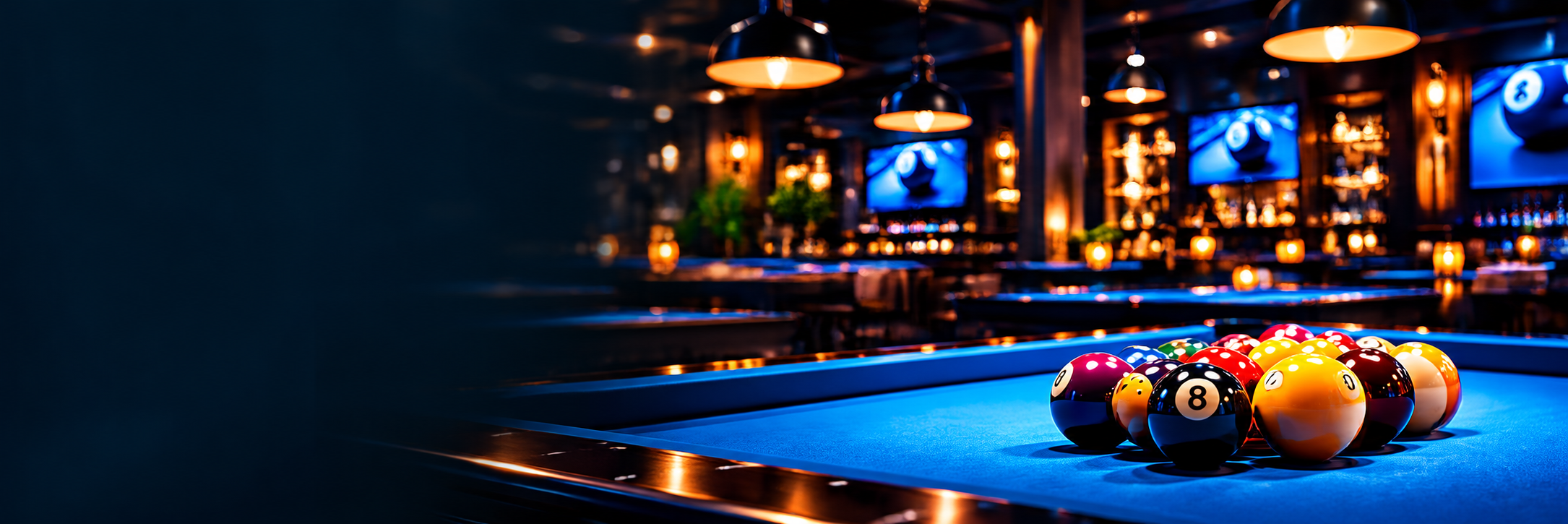 Racked billiard balls on a blue-felt pool table in The Shark Den