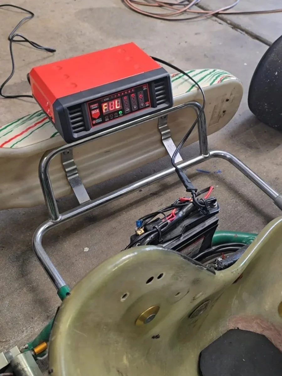 cable-tied the charging fixes to the battery pack so that we can charge the battery while it’s still attached to the kart.