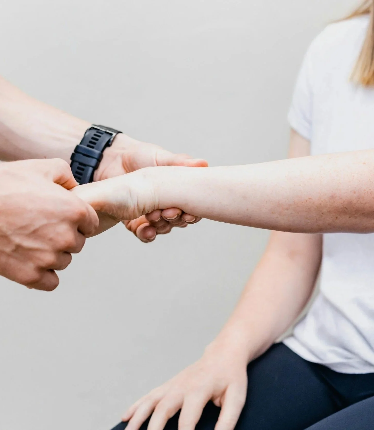 Chiropractor evaluating wrist alignment to relieve nerve compression and carpal tunnel symptoms at Chiro Health Vision in Pymble