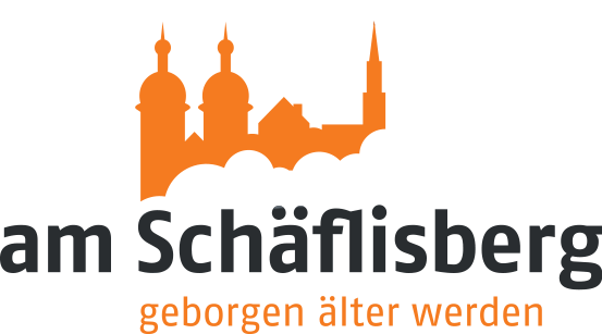 Silhouette einer Stadt mit dem St. Galler Kloster, darunter der Text 'am Schäflesberg' und 'geboren älter werden'.