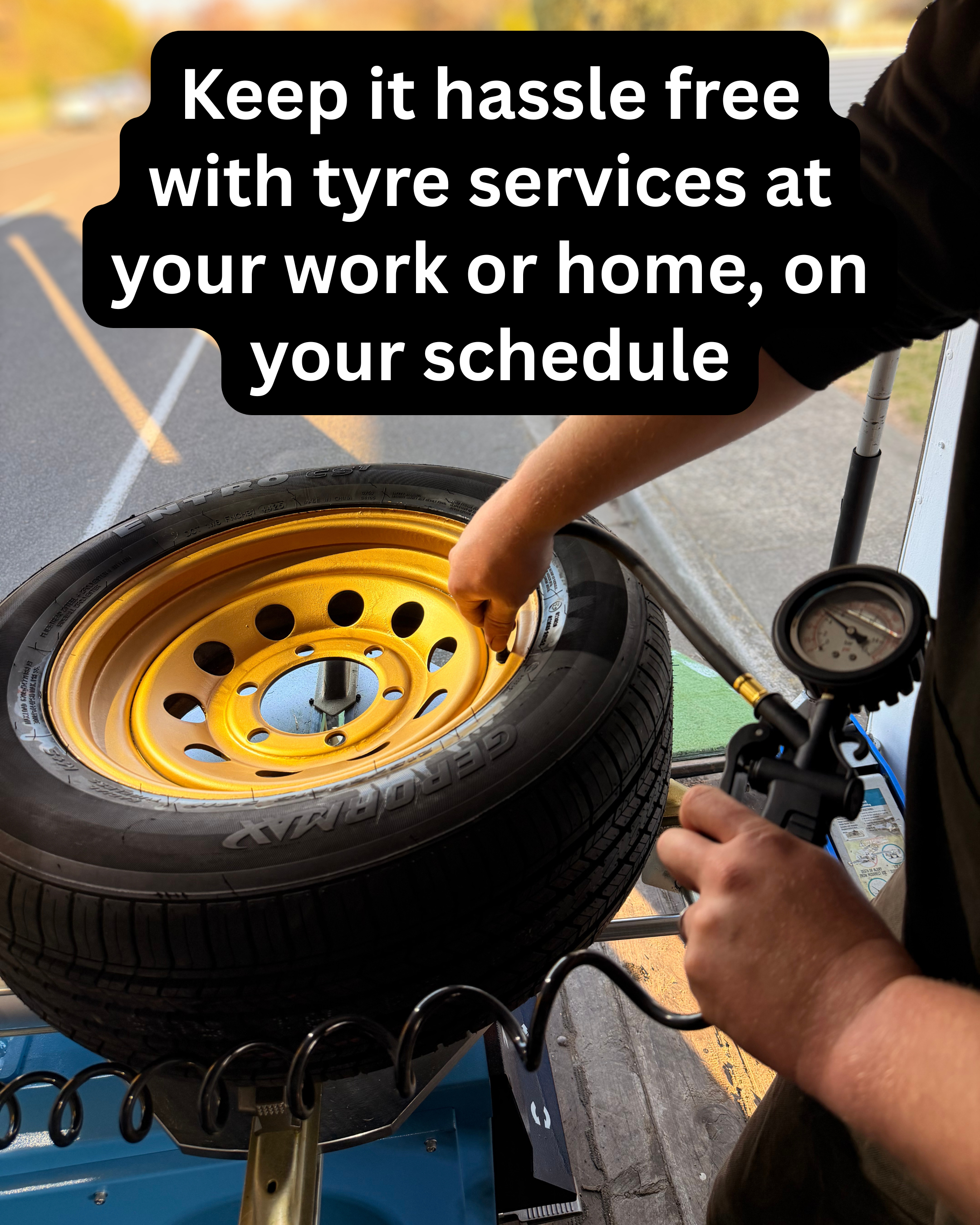a man pumping air into a tyre in his mobile tyre workshop in hawkes bay