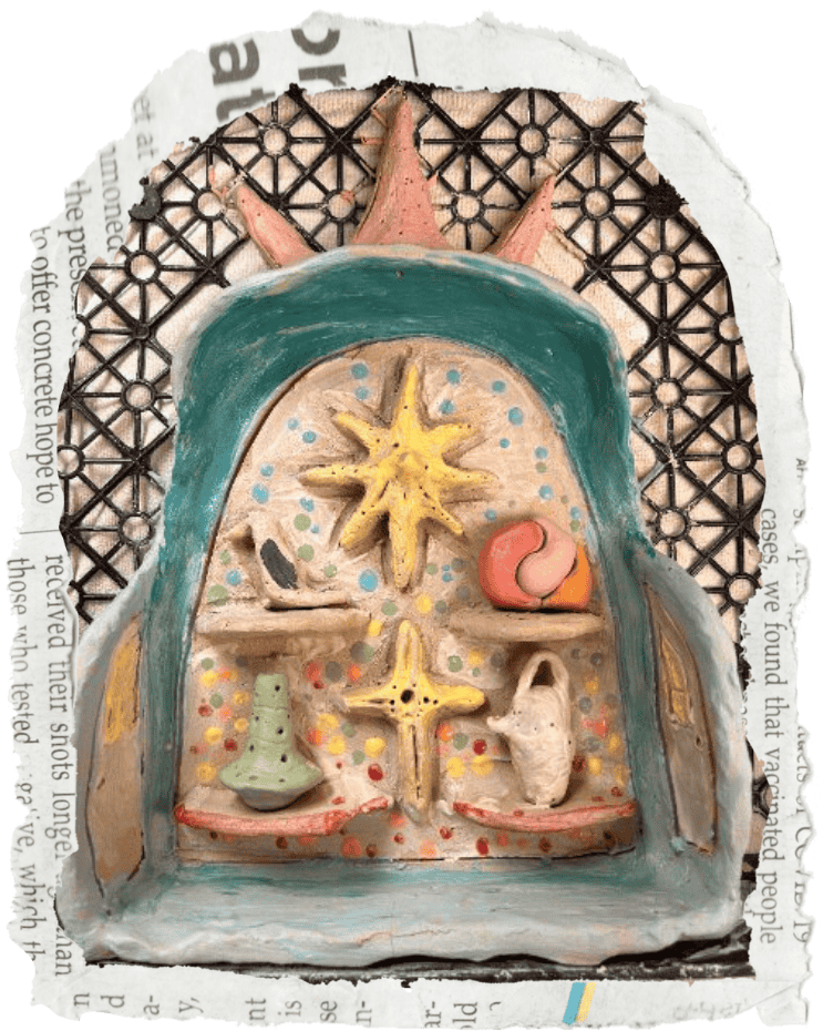 Colorful, carved ceramic art piece depicting a nativity scene with stars, a cross, a pitcher, and other shapes, set against a patterned background.