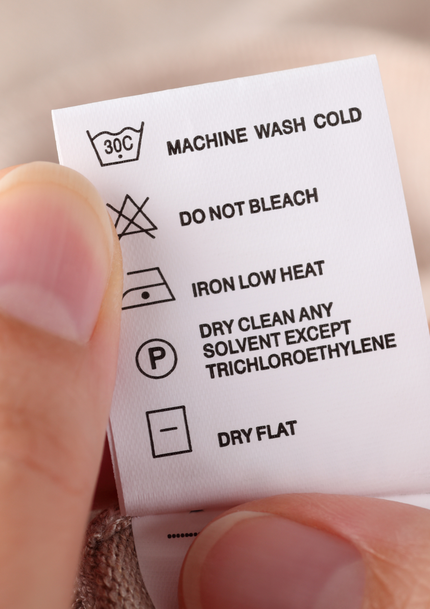 How to Read Clothing Care Labels (So You Don’t Ruin Your Favourite Garments)