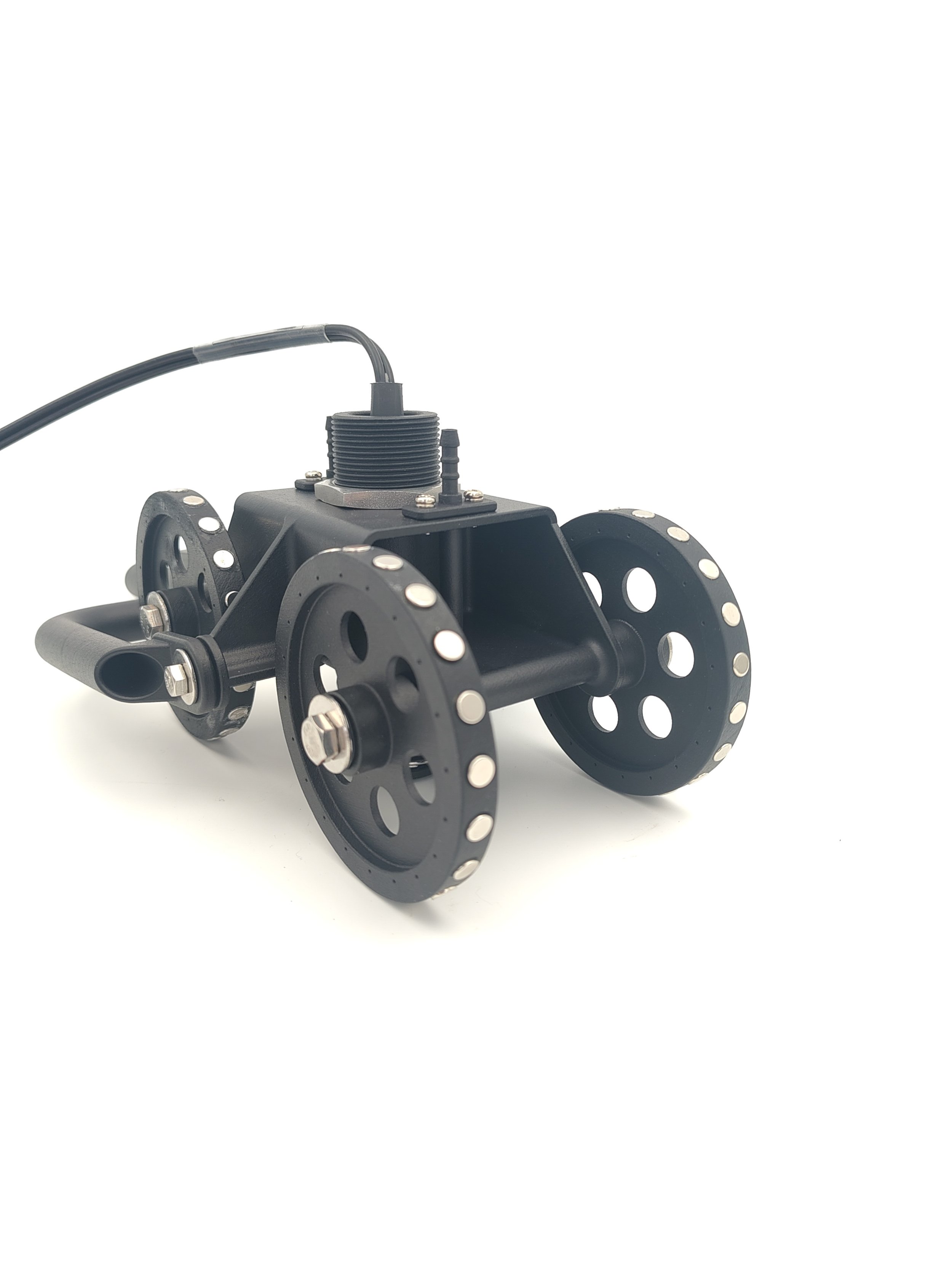 A black mechanical device with circular components and metal bolts, connected by a black cable, isolated on a white background.