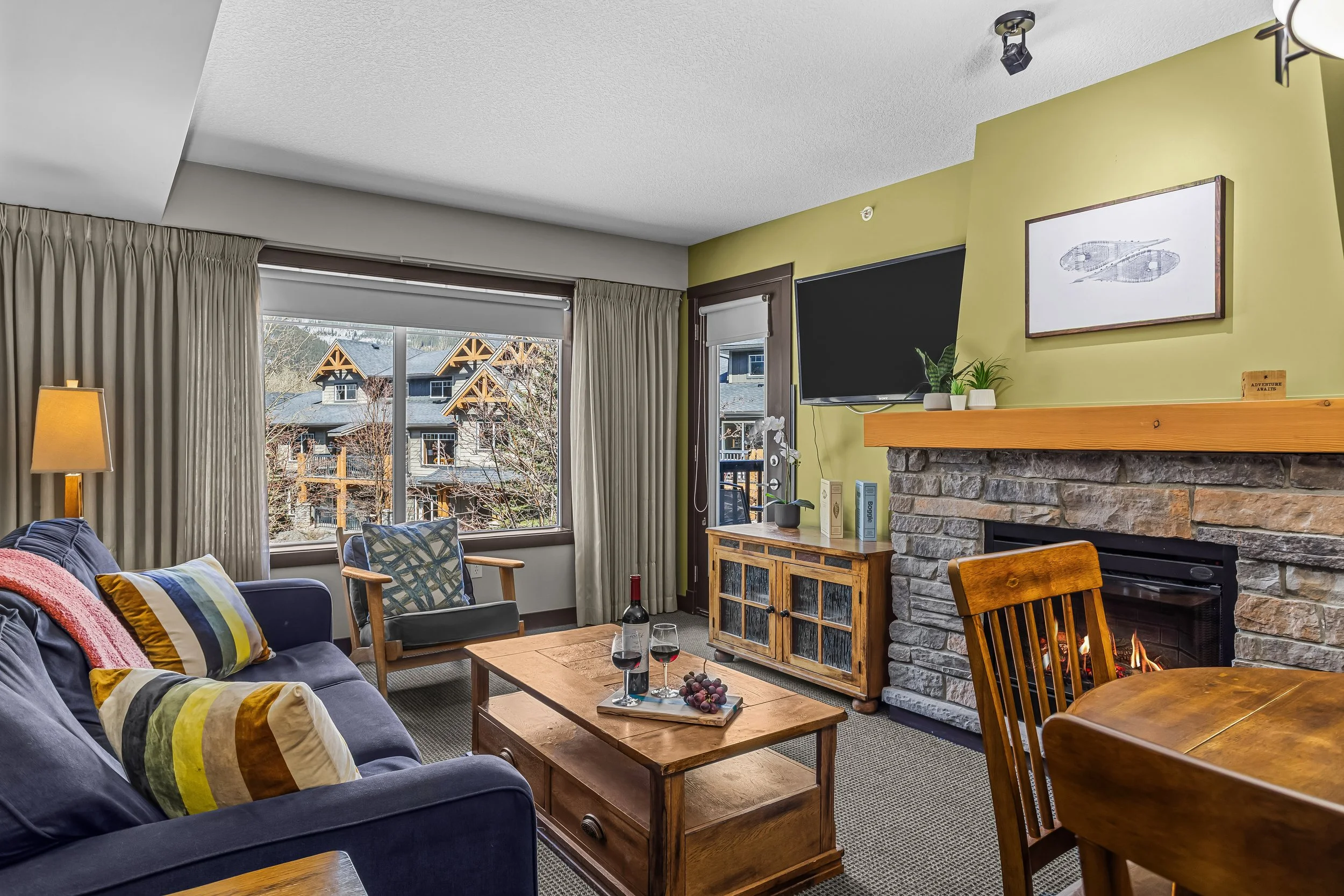 Cozy living room with fireplace and sofa bed