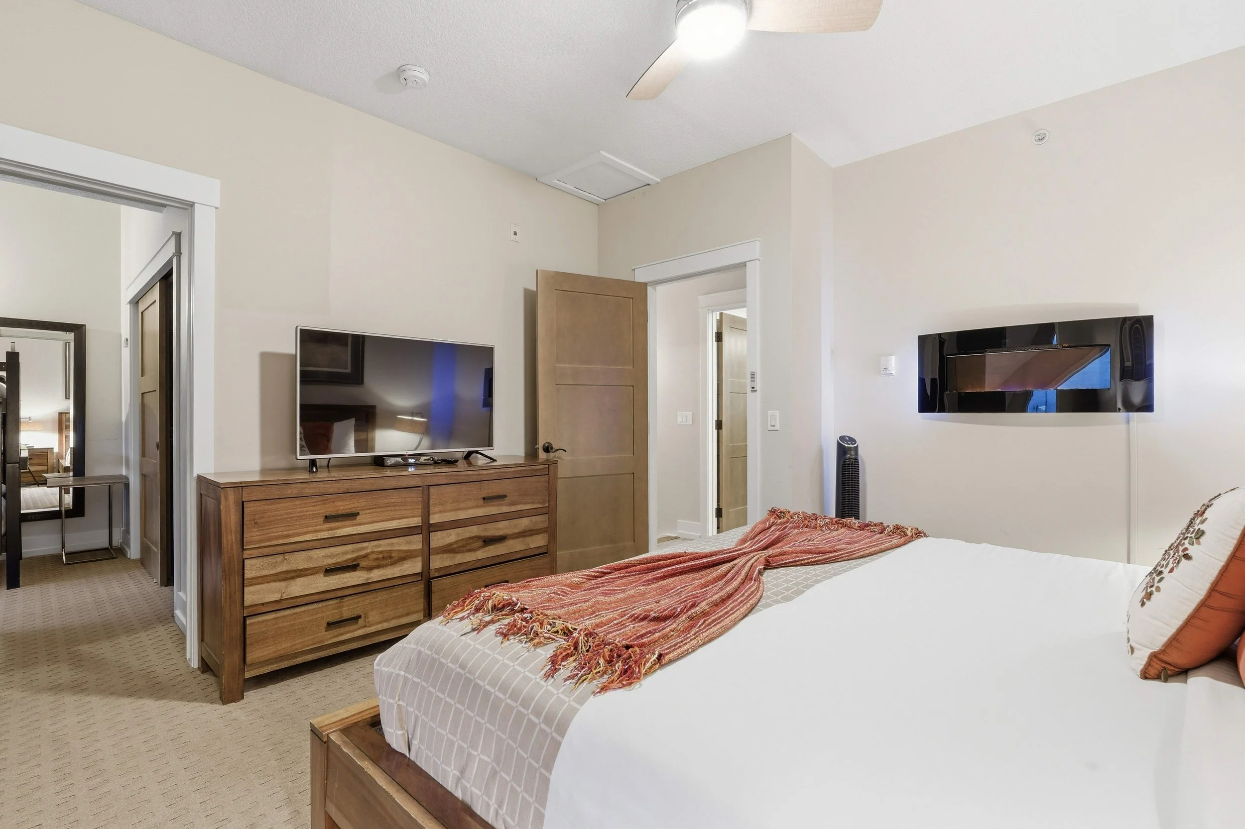 Master bedroom with king bed + bunk room