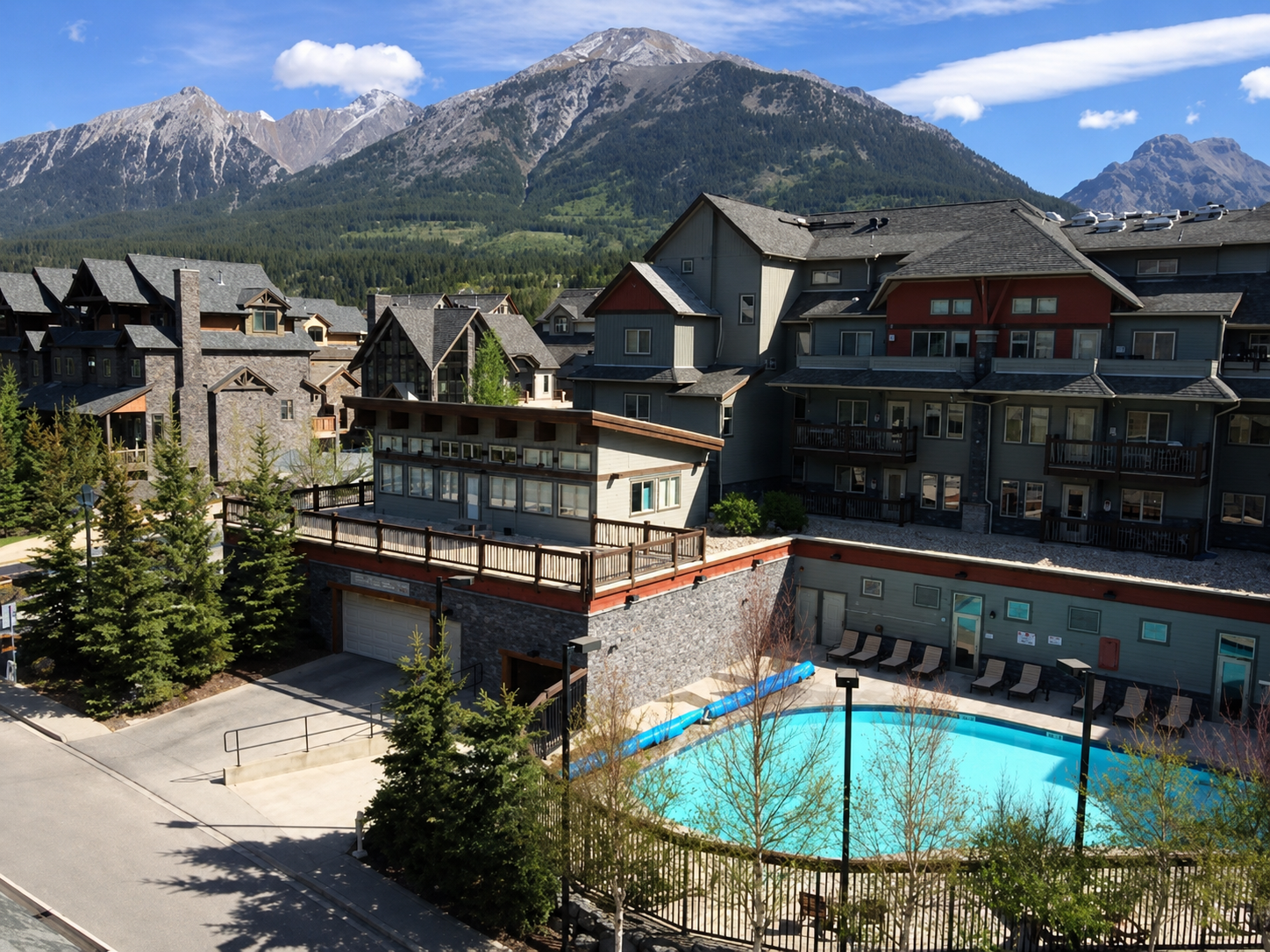 Desirable Mountain Condo | Heated Parking | Pool &amp; Hot tub