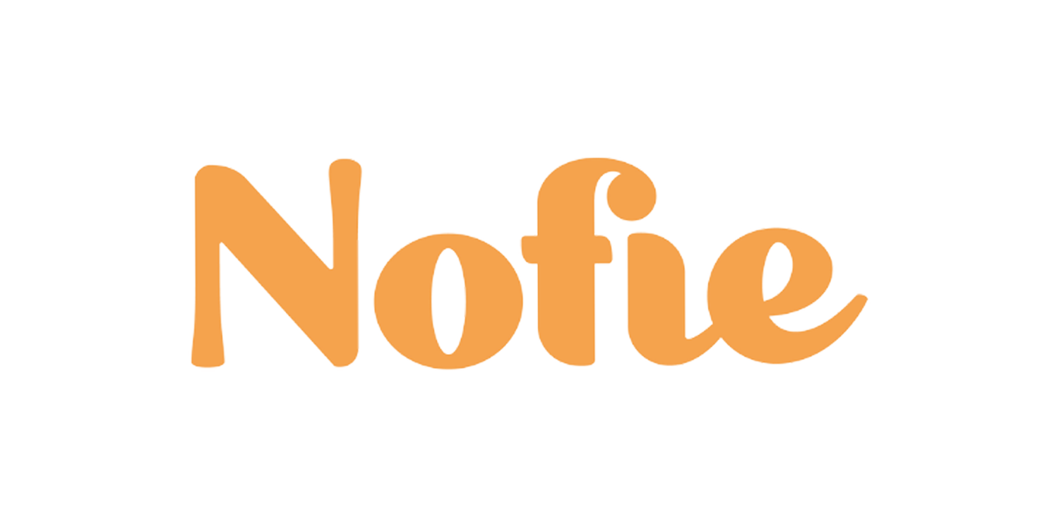 The word 'Note' written in orange, playful font on a light beige background.