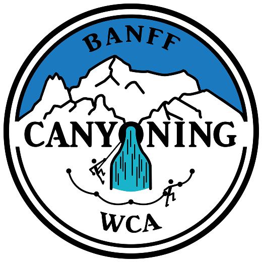 Logo for Banff Canyoning WCA featuring mountain silhouettes, a waterfall, and two climbers on a rope in black and blue colors.
