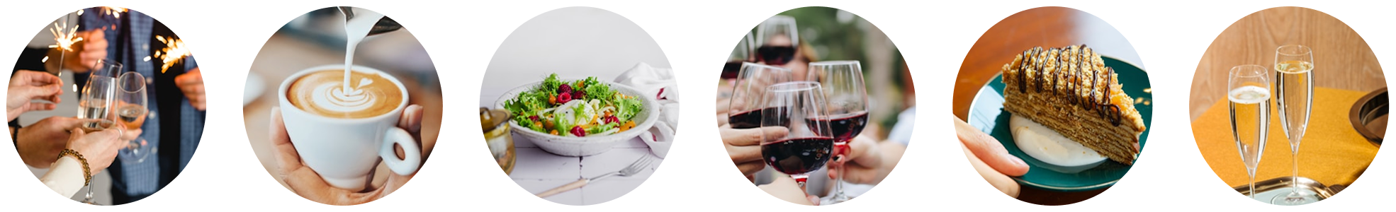 People celebrating with sparklers and clinking champagne glasses, coffee with milk, fresh salad, wine glasses filled with red wine, slice of layered cake with icing, and two glasses of champagne on a table.