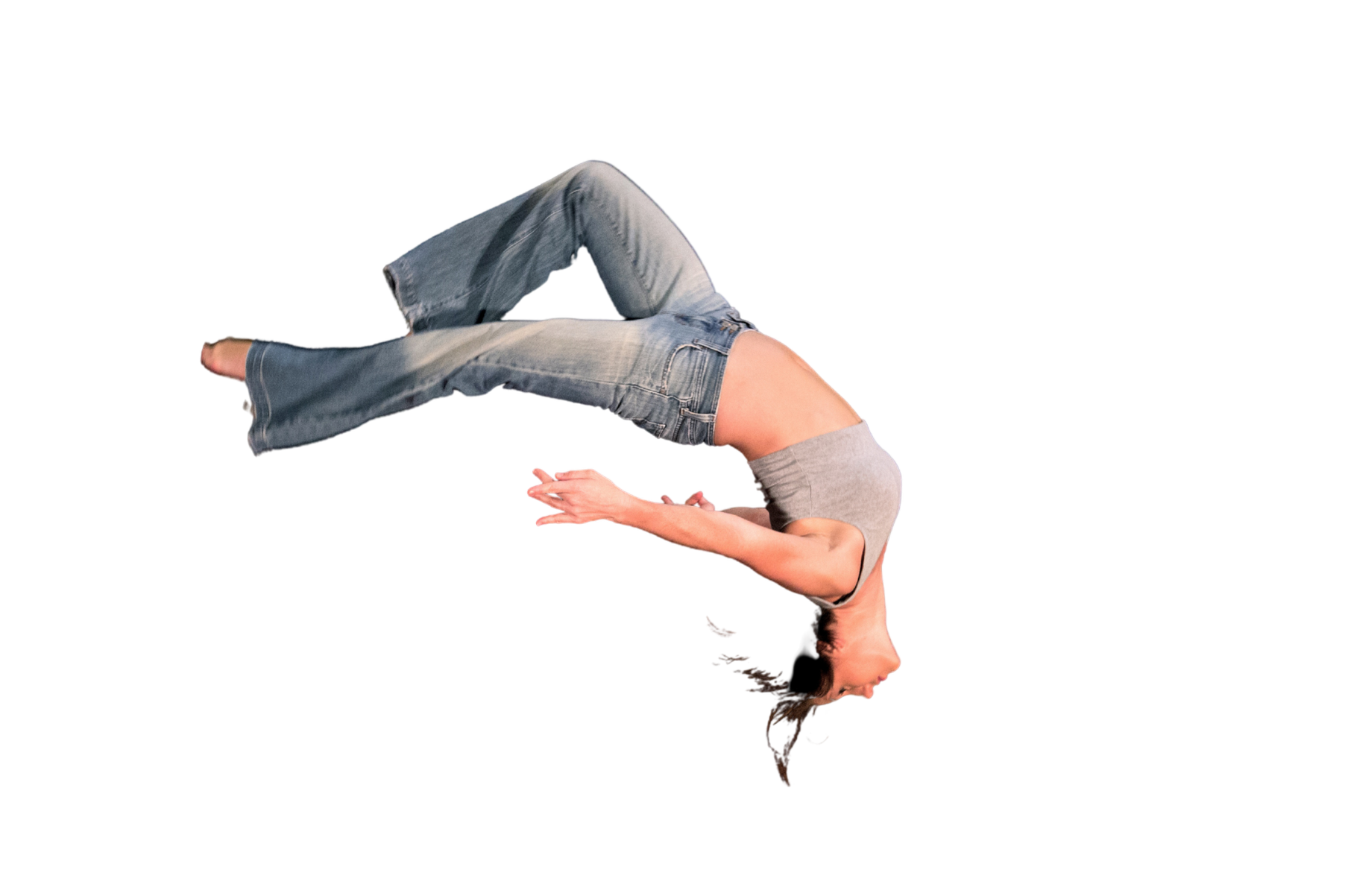 A woman in gray top and jeans performing a backward, arched slate.