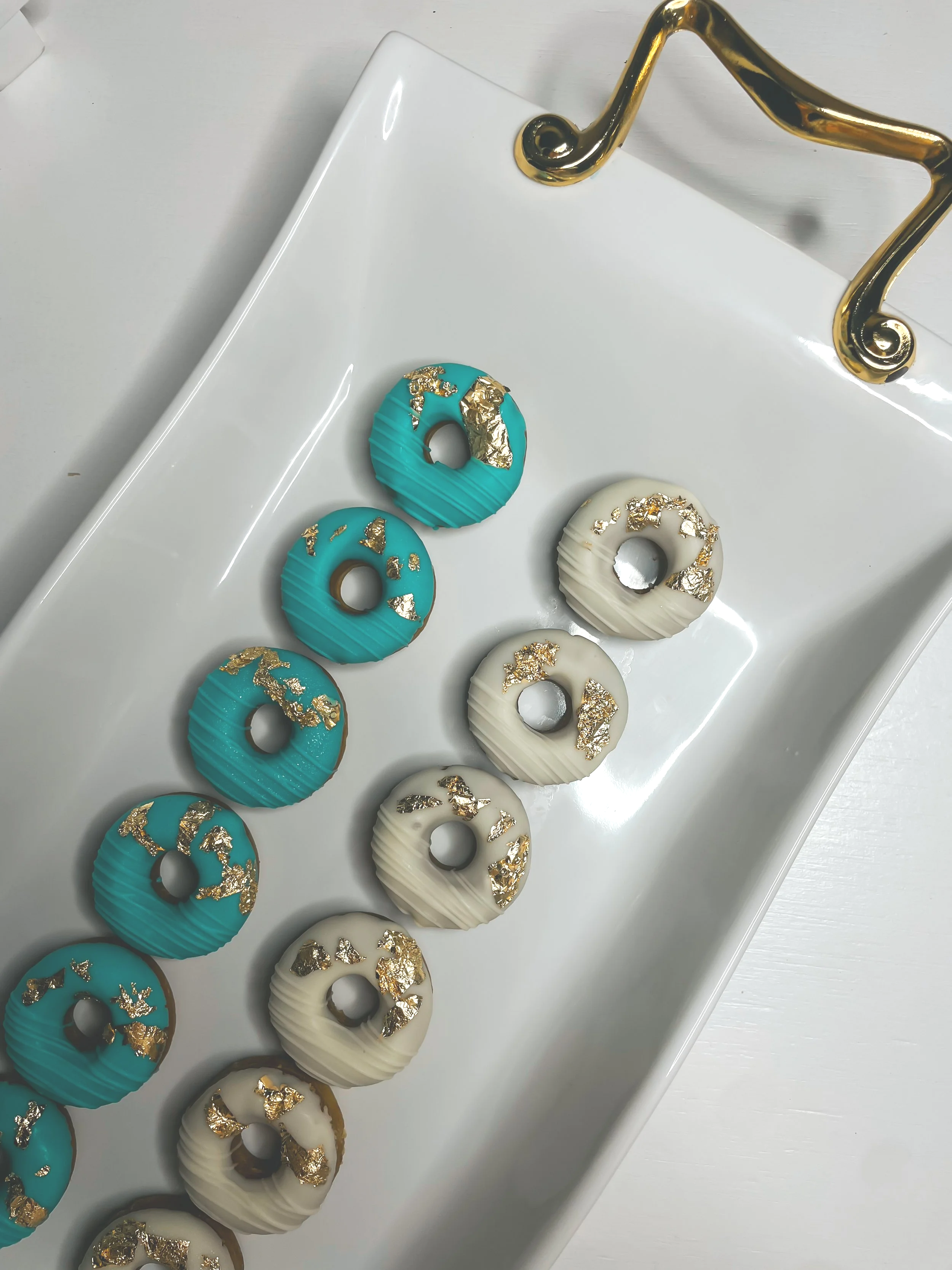 blue and white gold donuts.png