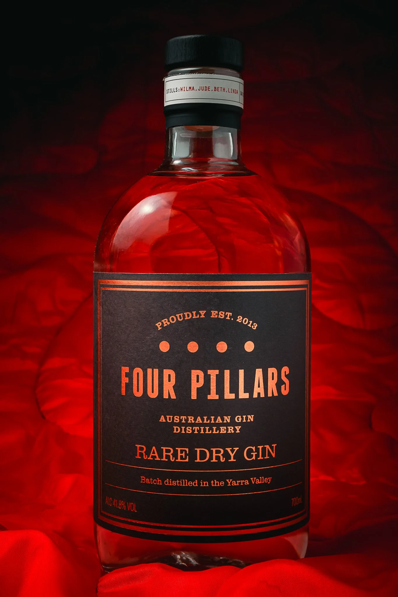 Softly lit four pillars in camping setting – lifestyle product photo