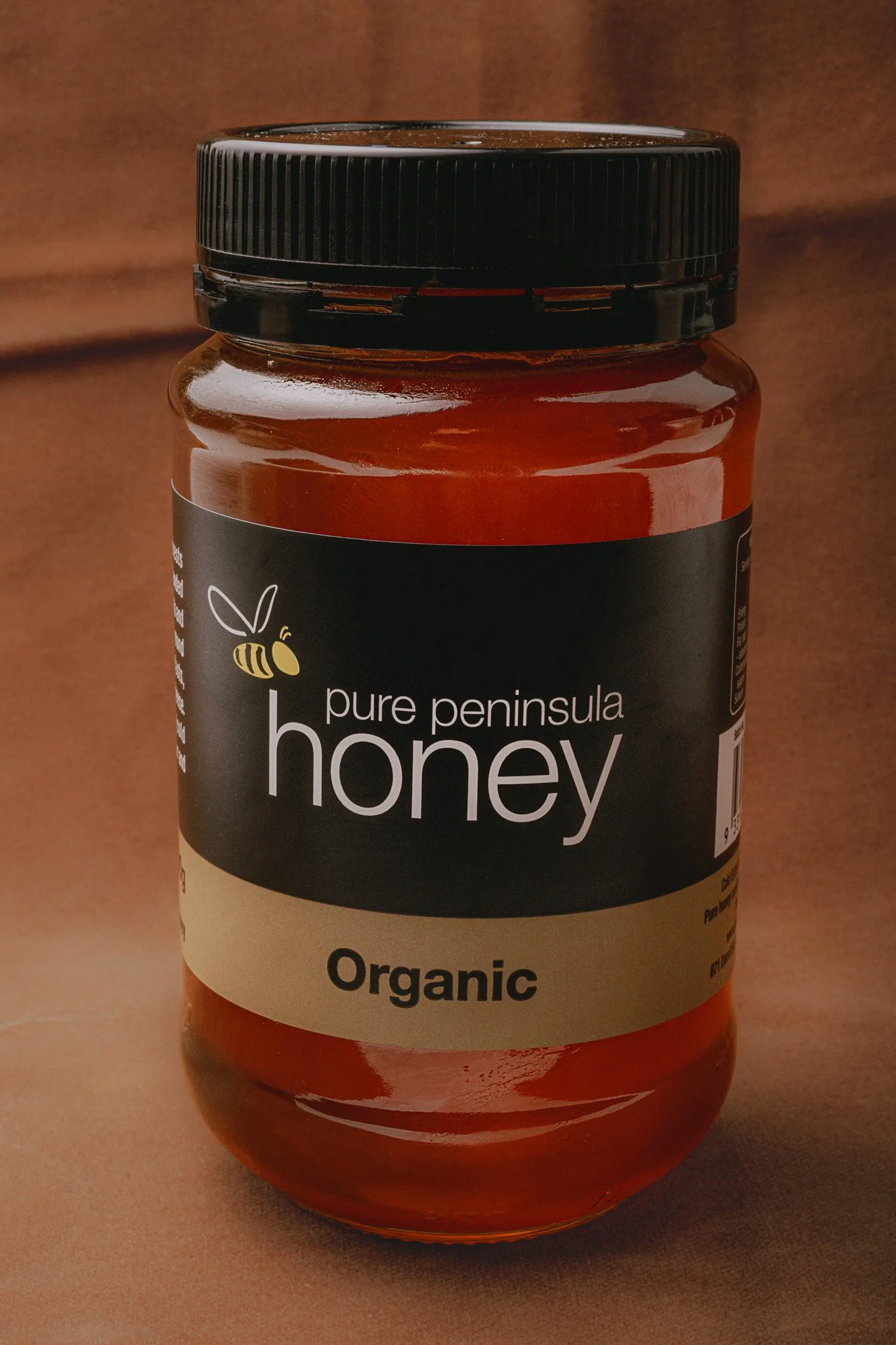 Pure Peninsula organic honey jar – studio product photography