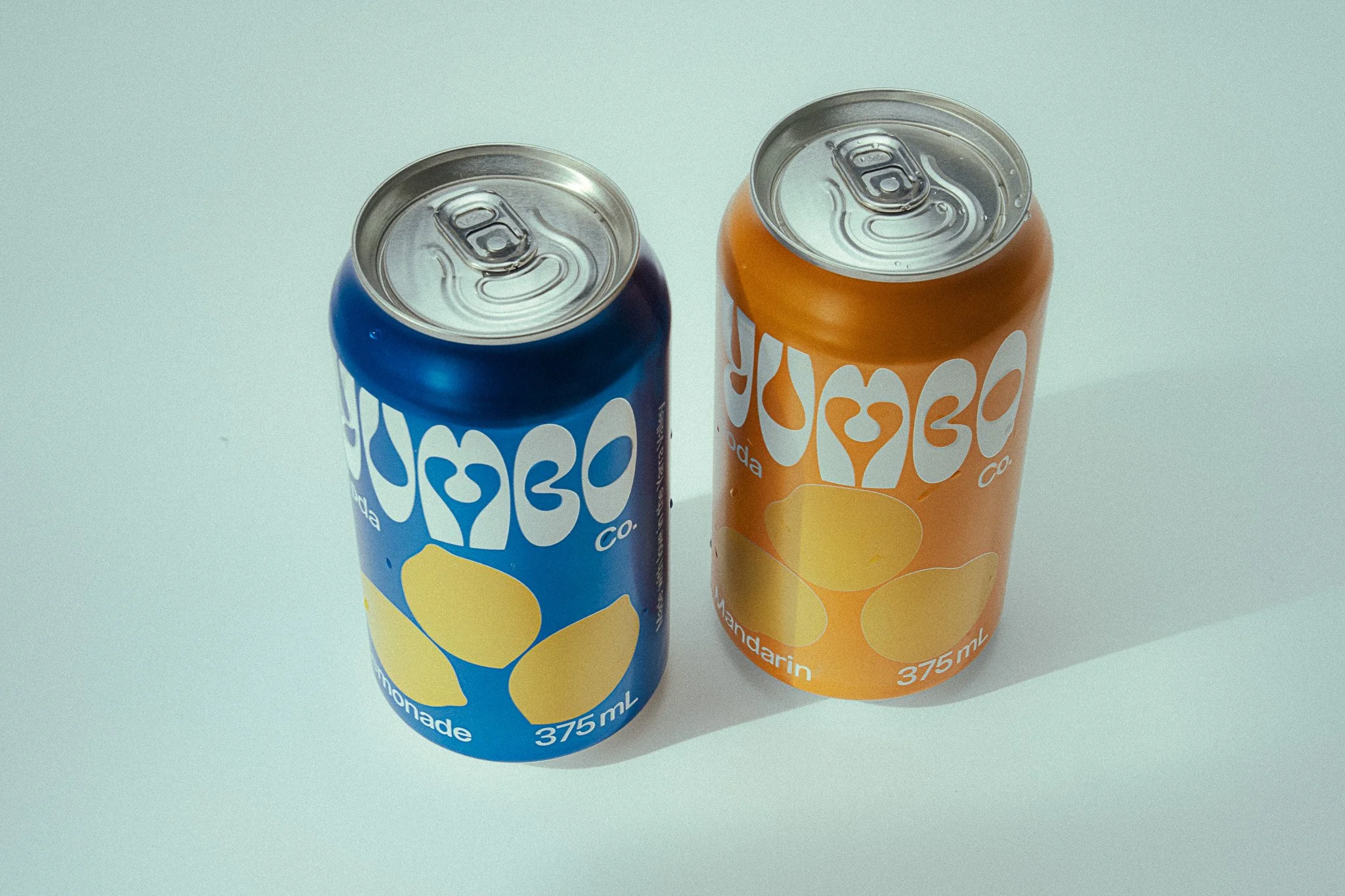 Yumbo soda can product photography – studio editorial with high-class props