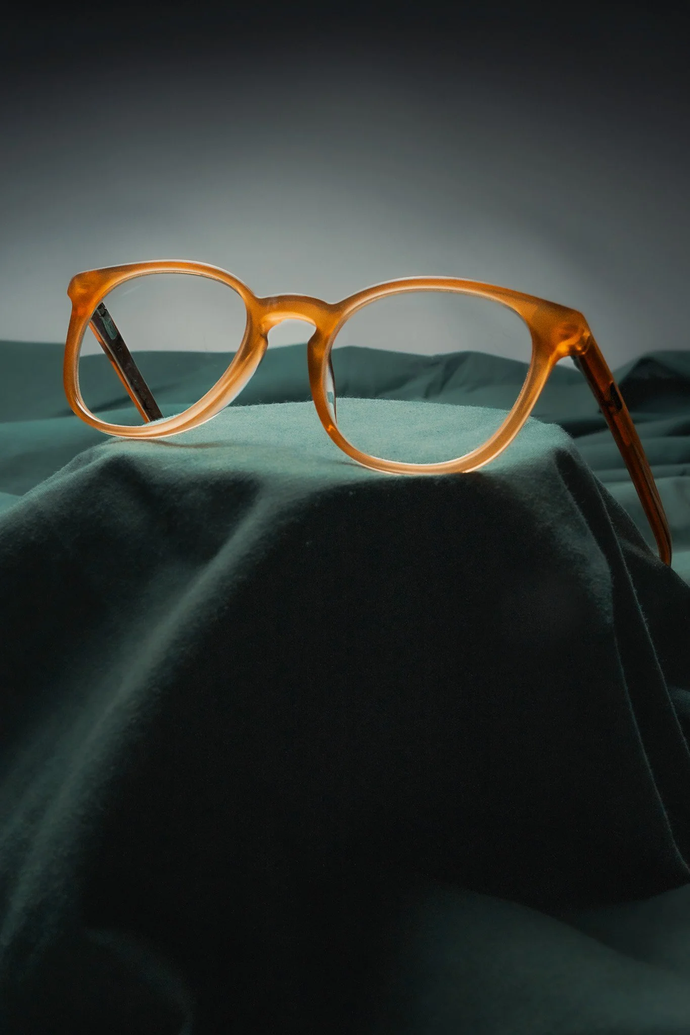 Barbour lifestyle accessories – glasses product photography in green studio