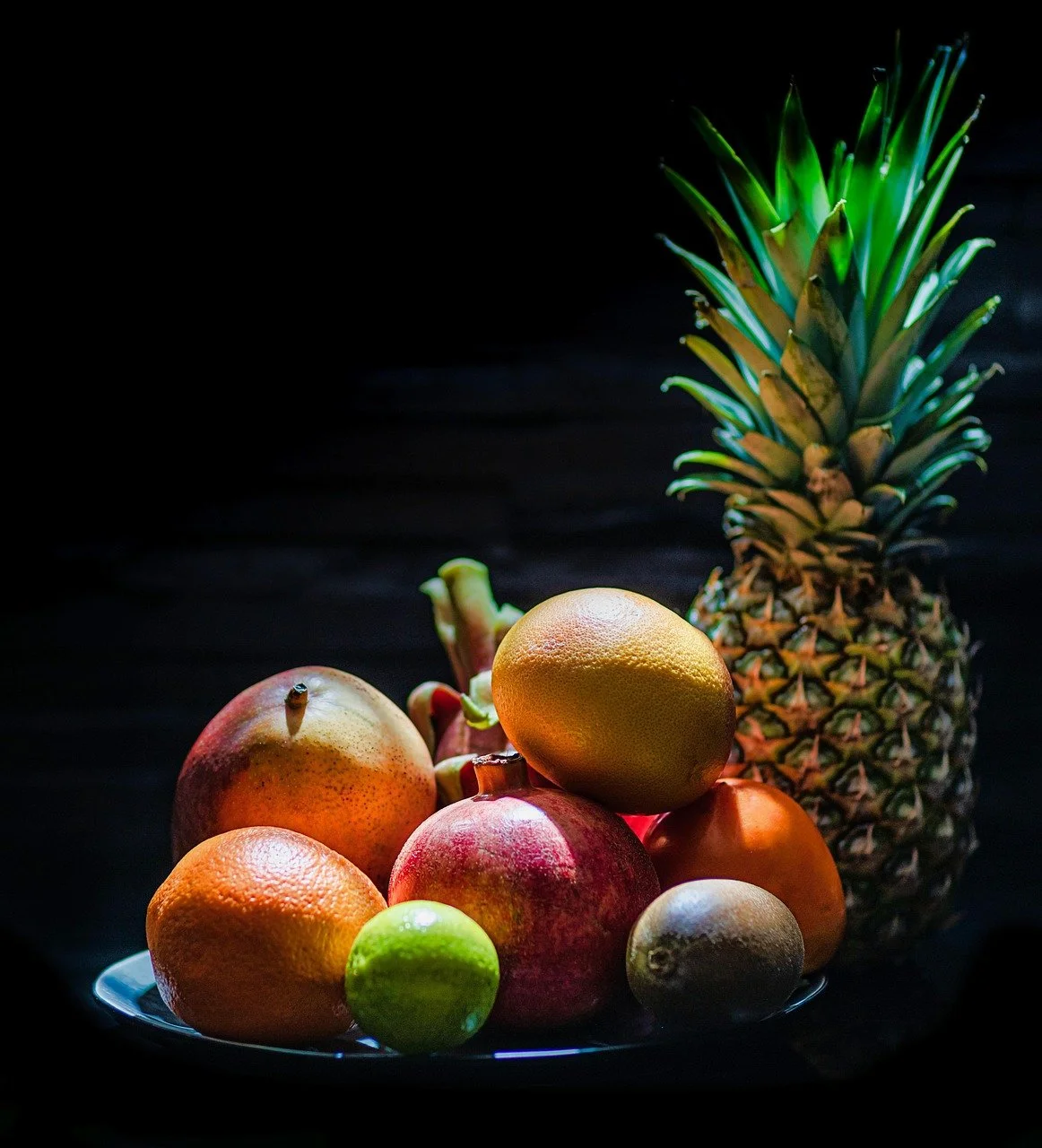 Large bowl filled with a variety of fruits