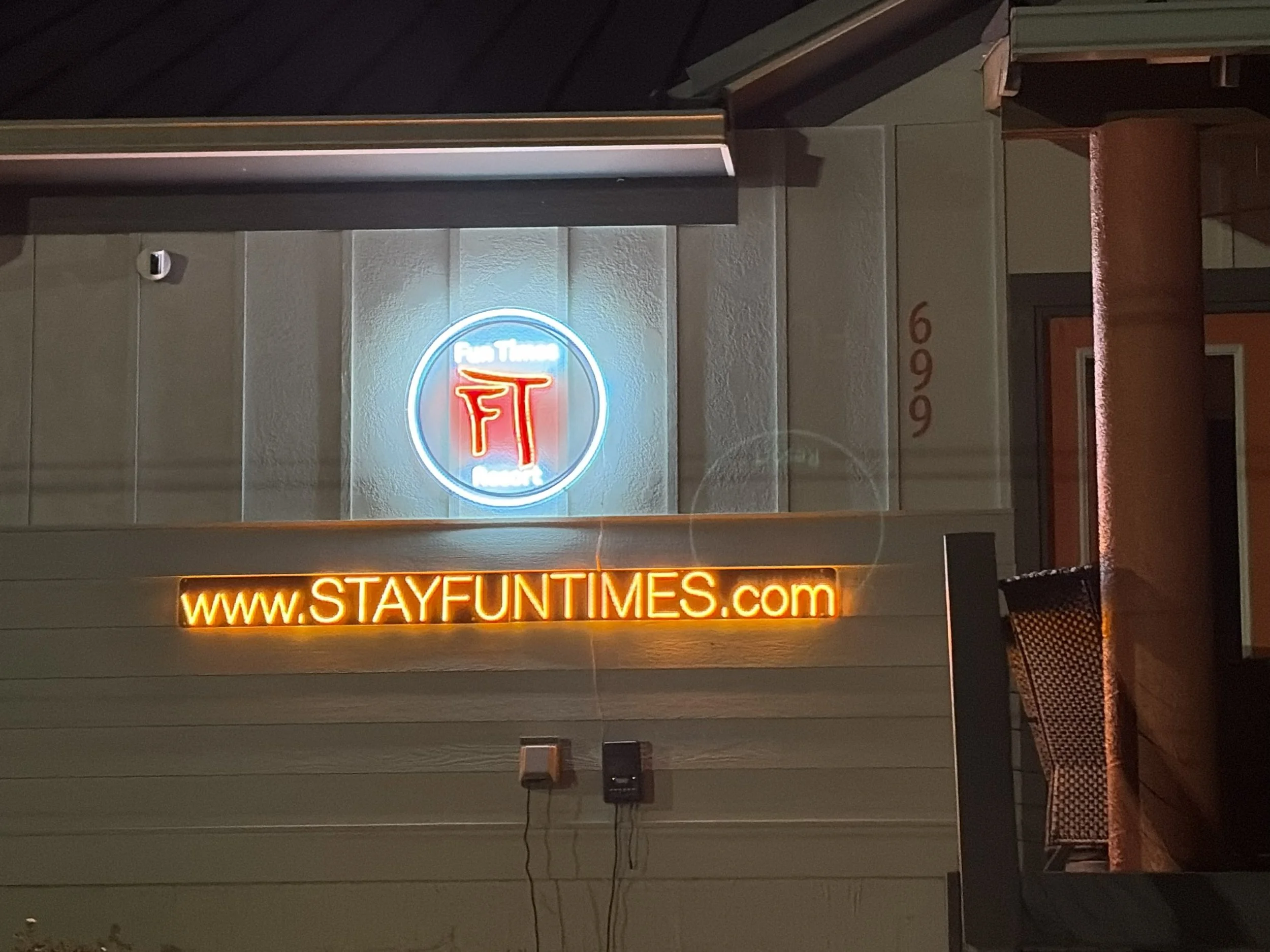 Stayfuntimes neon sign at night.jpg