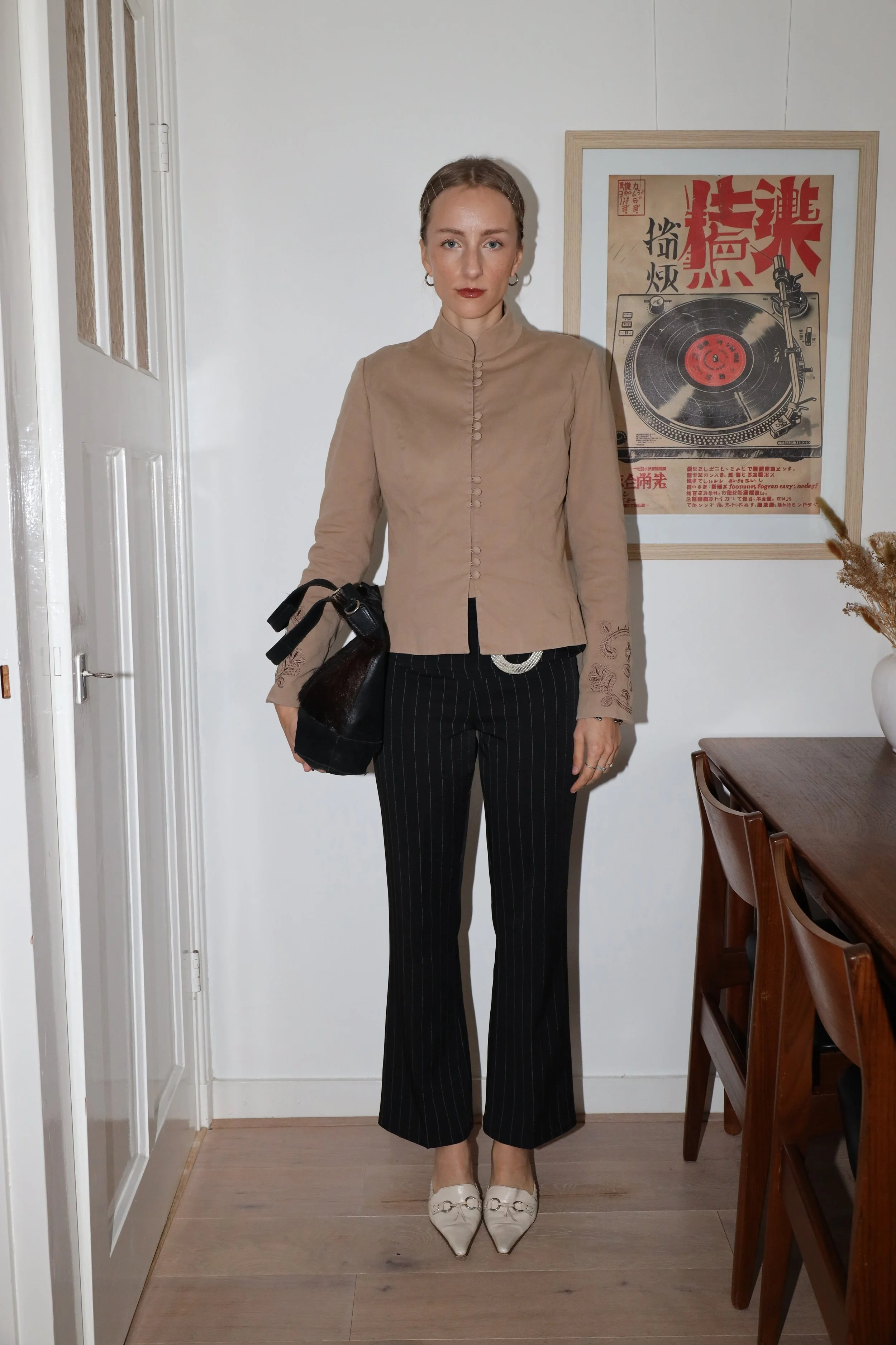 BUCKLE PINSTRIPE TROUSERS