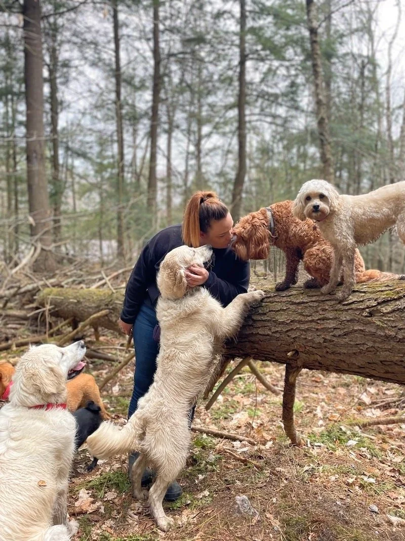 Tammy Egan hiking with dogs