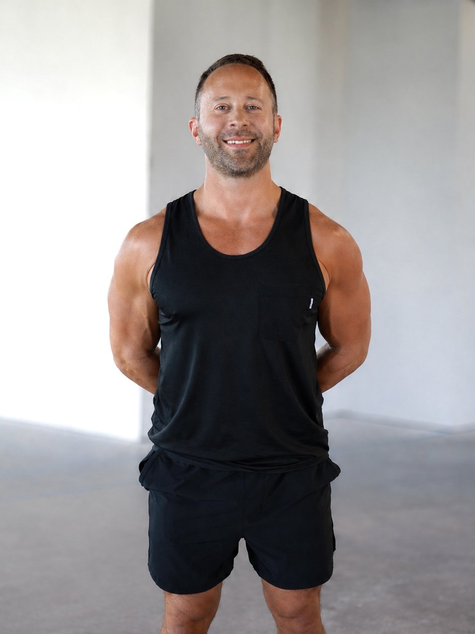 Lagree30A instructor in black athletic wear at modern Megaformer studio