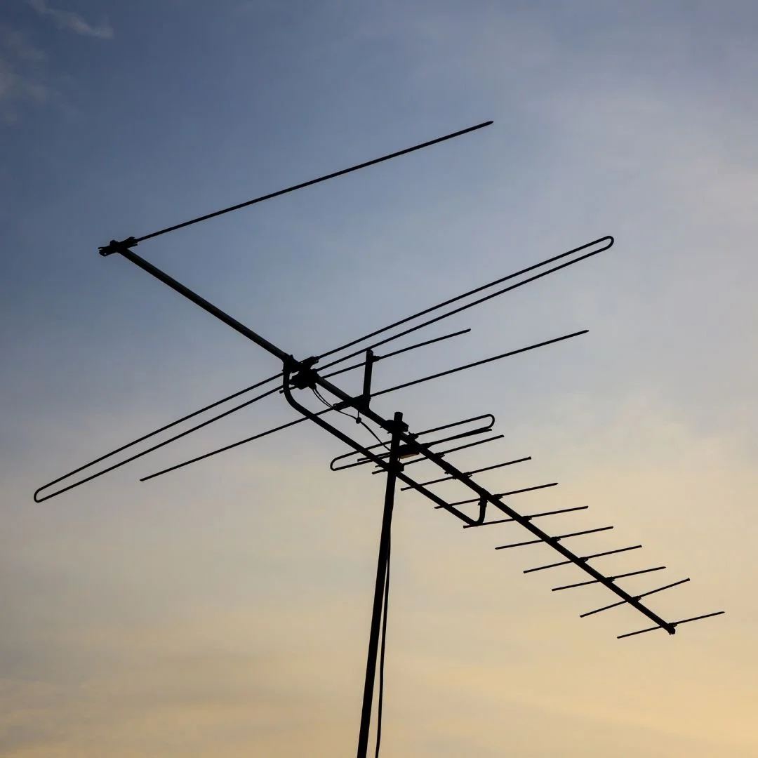 Satellite antennae receive and relay information, representing the process of learning and collaboration vital to true mineral circularity governance.