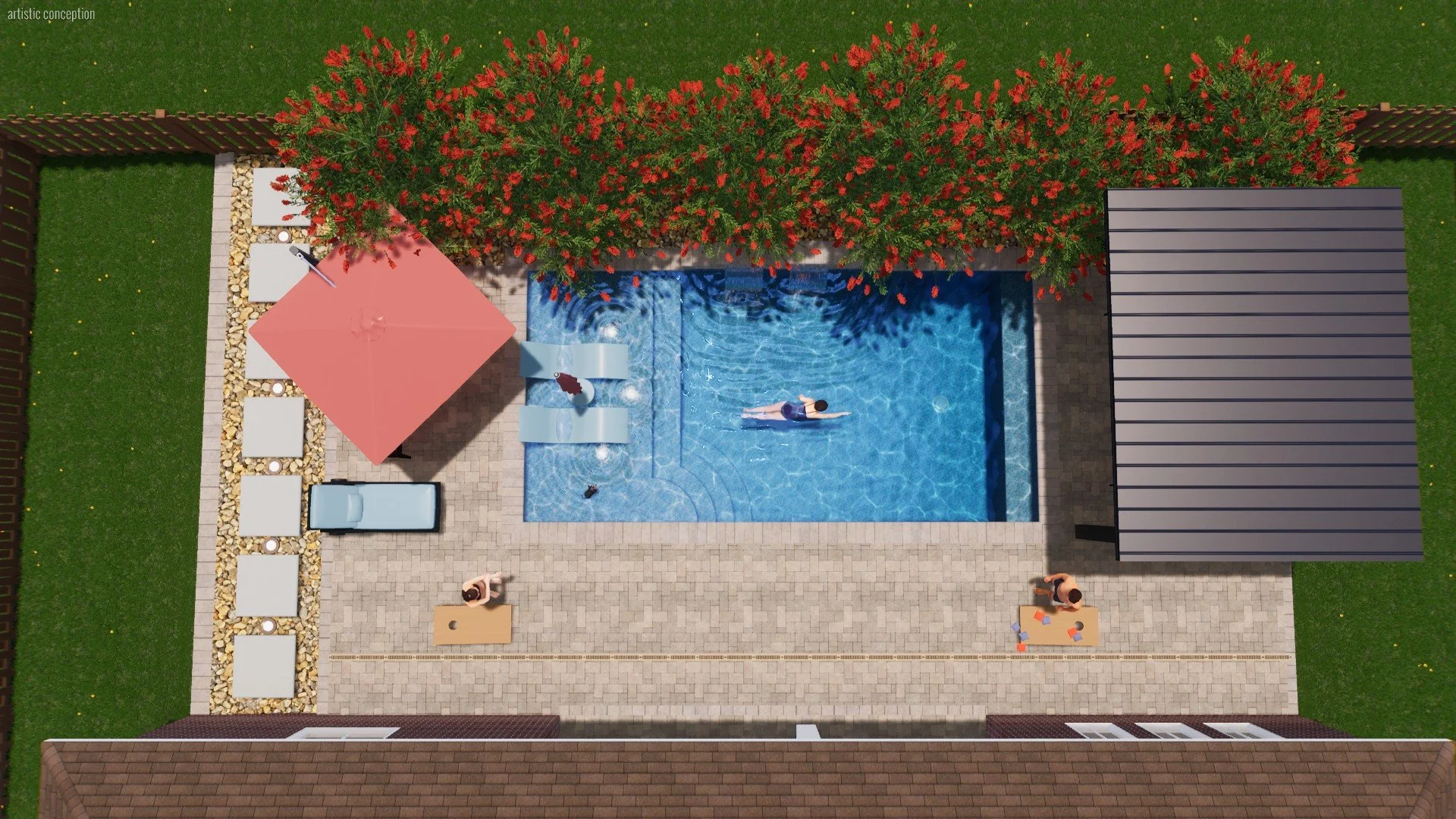 Top view of backyard with swimming pool, red flowering trees, a table with an umbrella, lounge chairs, and two people near the pool.