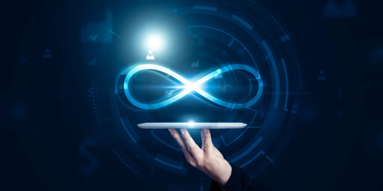 A hand holding a digital tablet with a glowing infinity symbol emerging from it, surrounded by technological and digital interface elements.