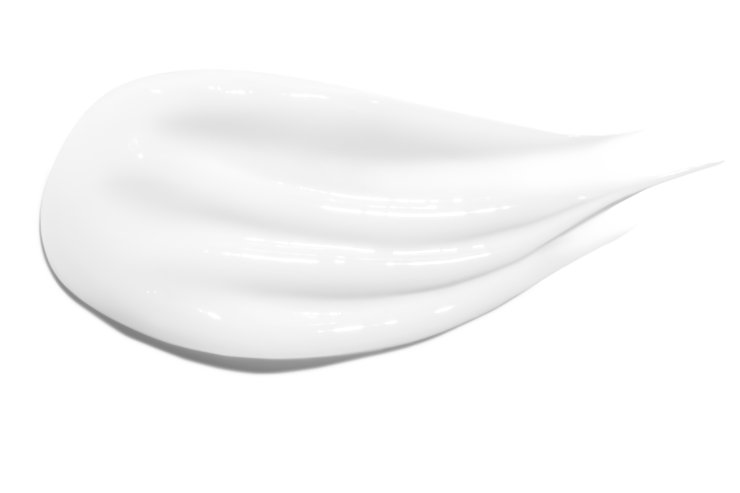 White cream or lotion swirled on a black background