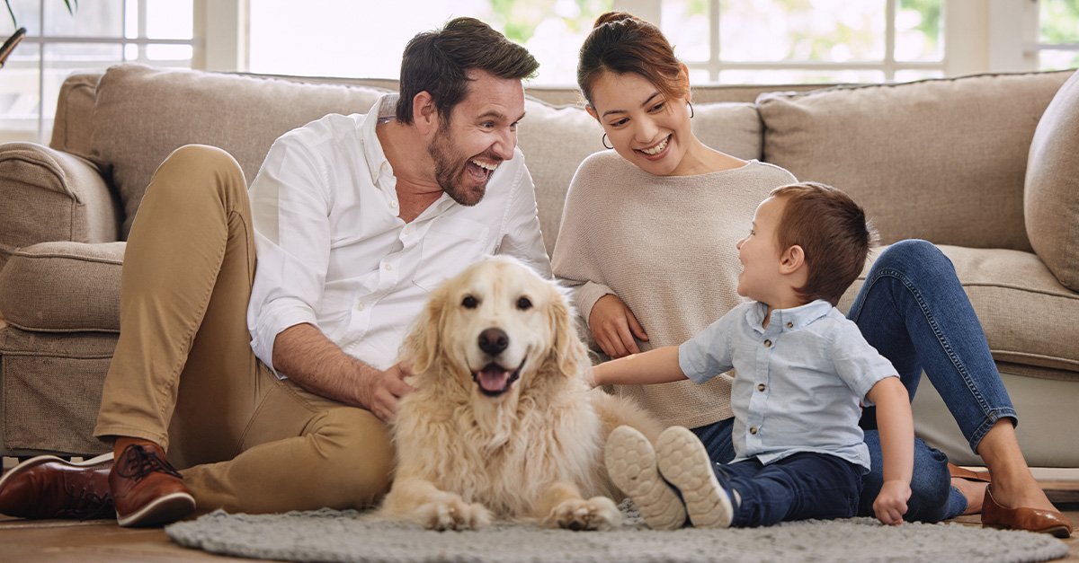 A family of three with their dog