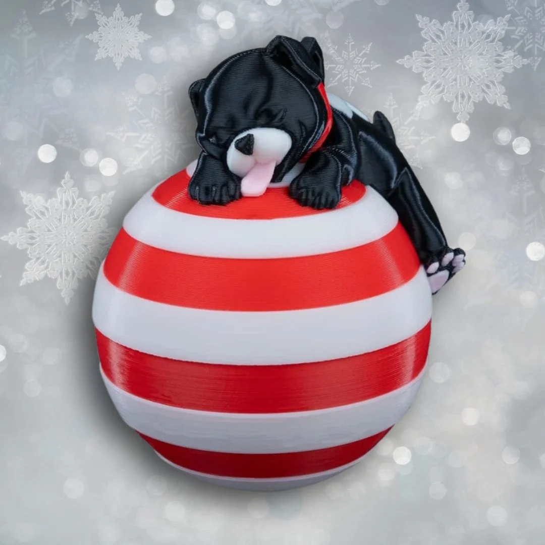 🎄✨ NEW from PrintZilla! ✨🎄
Meet two of the cutest additions to our Holiday Collection &mdash; the Sleeping Kitten Ornament and Sleeping Puppy Ornament! 🐱💤🐶

Hand-crafted on our 3D printers with love (and a little holiday magic), these ornaments 