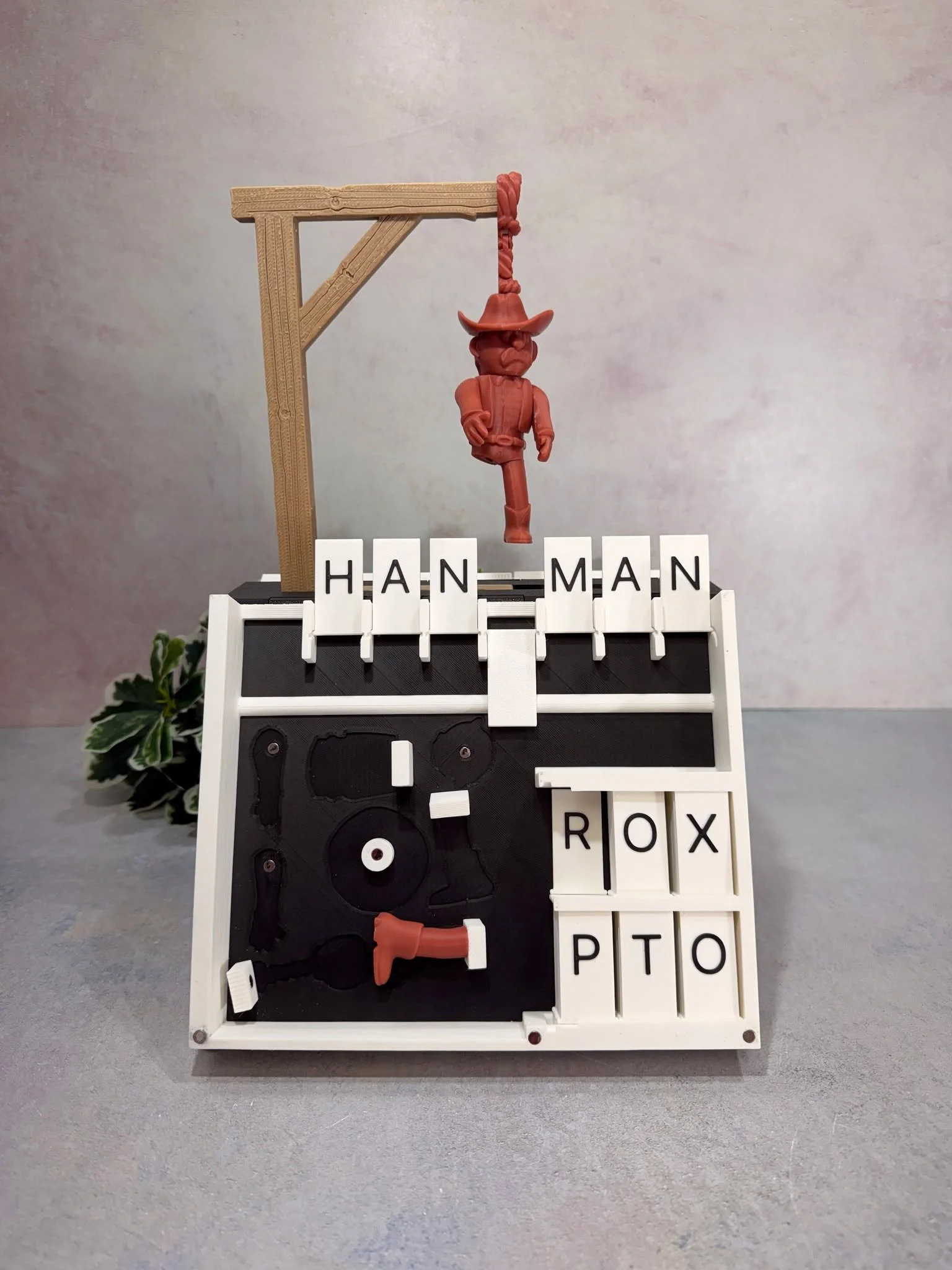 📼✨ Happy National Retro Day! ✨📼

Nothing says old school fun like a classic game of Hangman!

Our 3D printed Hangman Game Book looks like a sleek book on the shelf &mdash; but open it up and you&rsquo;ve got a fully playable retro game inside! 🙌

