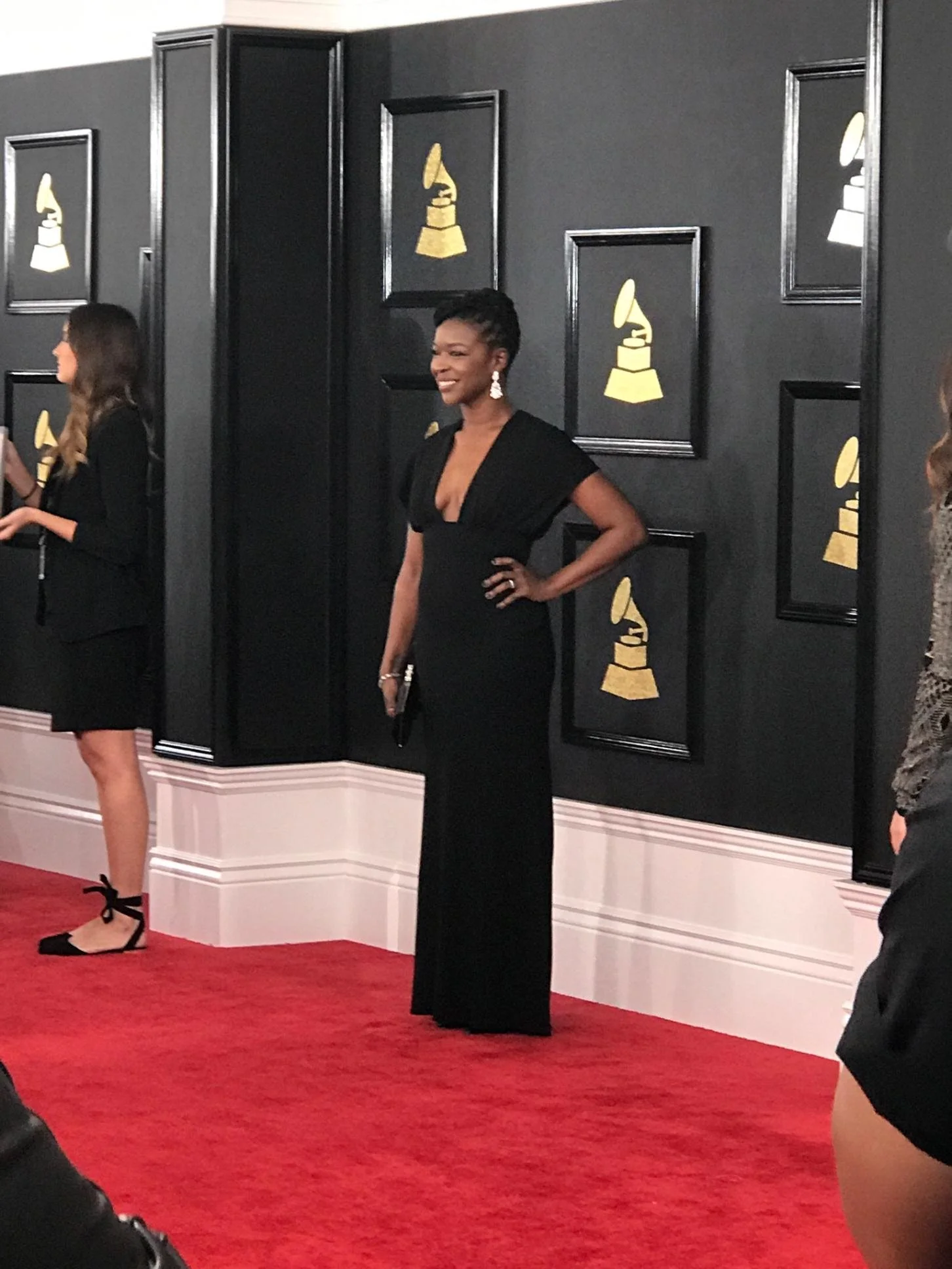  Rachel Cato in a full length, black gown at the 59th Grammy Awards 