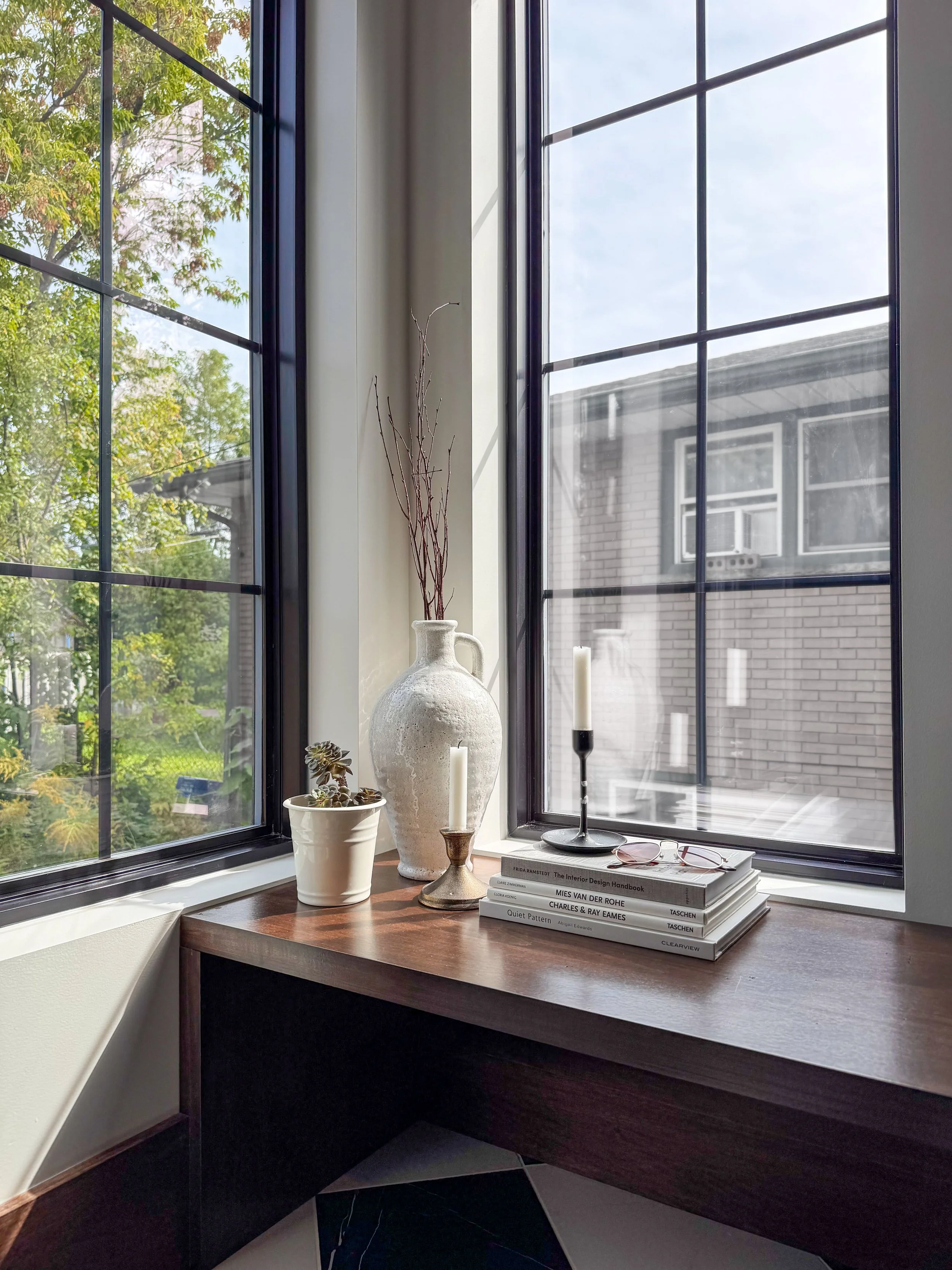 Custom Mudroom Featuring Expansive Windows and Custom Bench Seating.