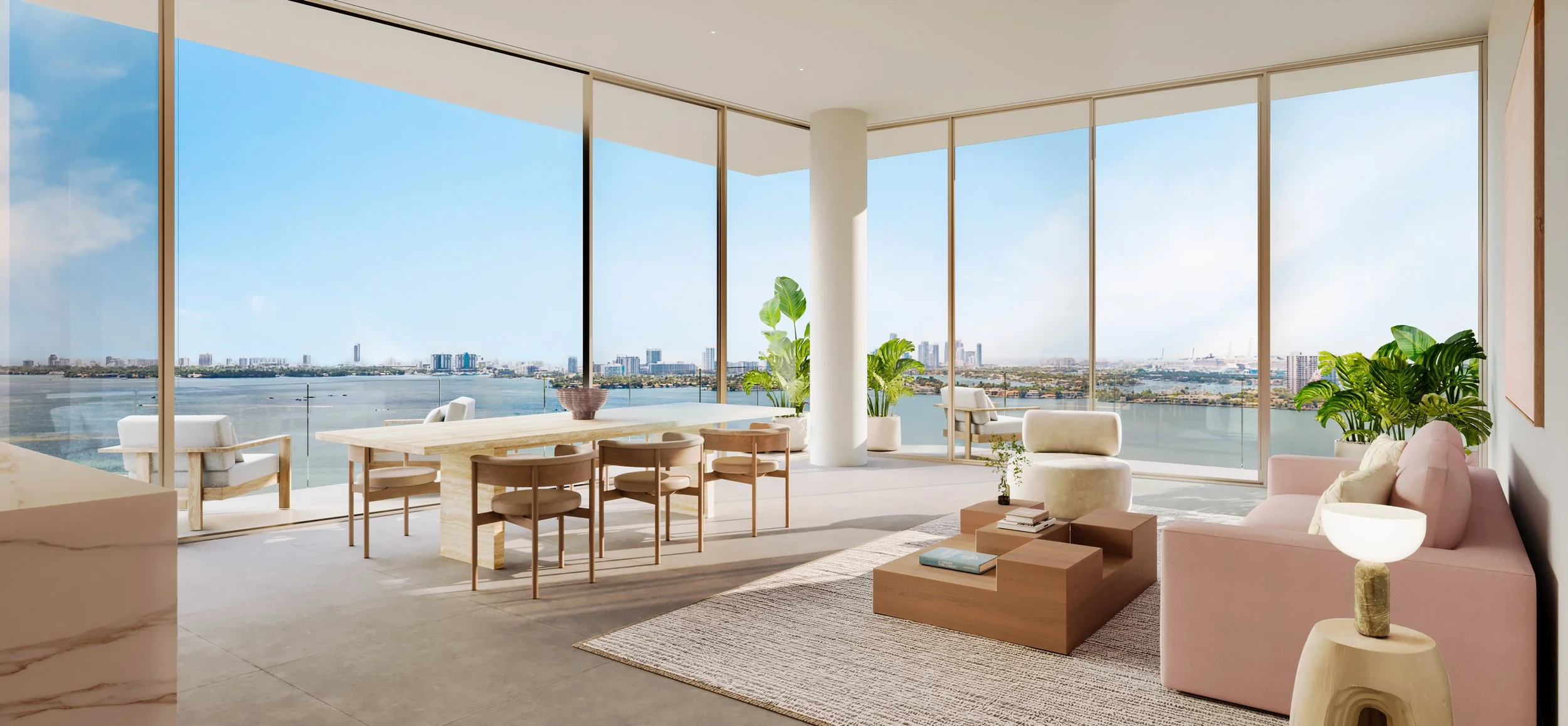 Living room with floor-to-ceiling windows offering a city and water view, modern furniture including a pink sofa, white armchair, wooden coffee table, and potted plants.
