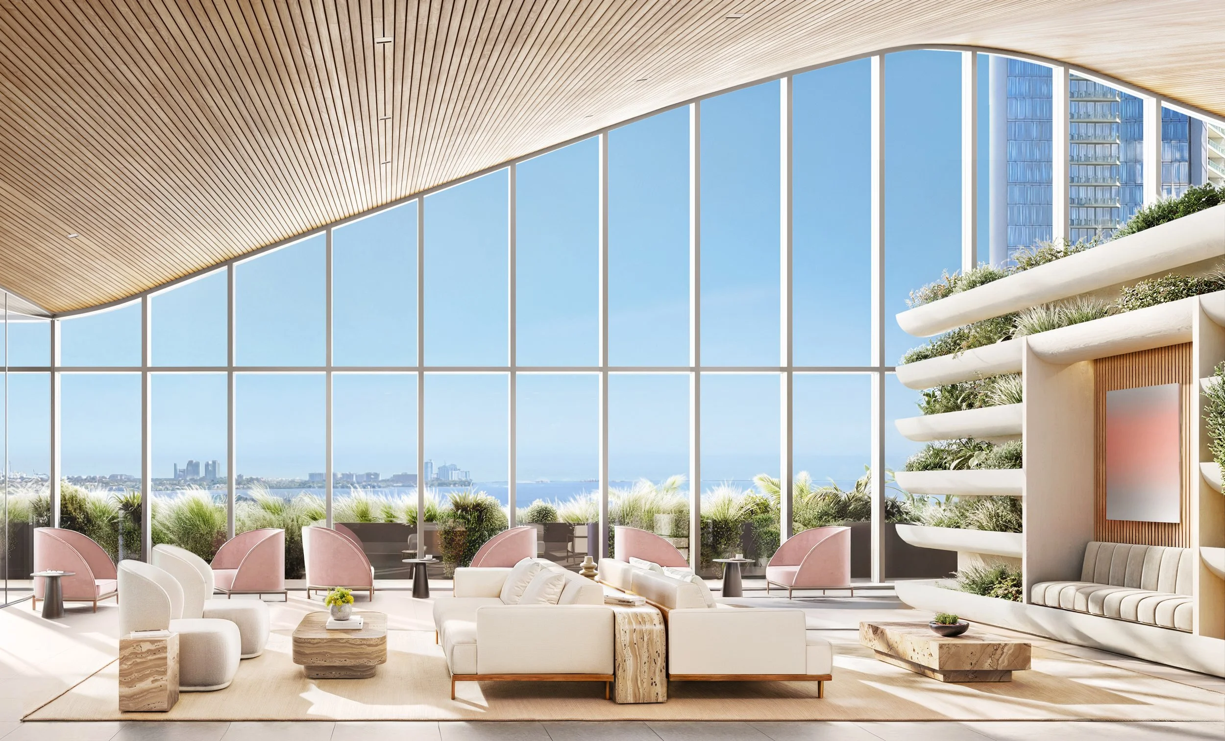 Modern interior space with large floor-to-ceiling windows, overlooking a city skyline and water. The room has light-colored furniture, including chairs, sofas, and tables, with potted plants and a wooden ceiling.